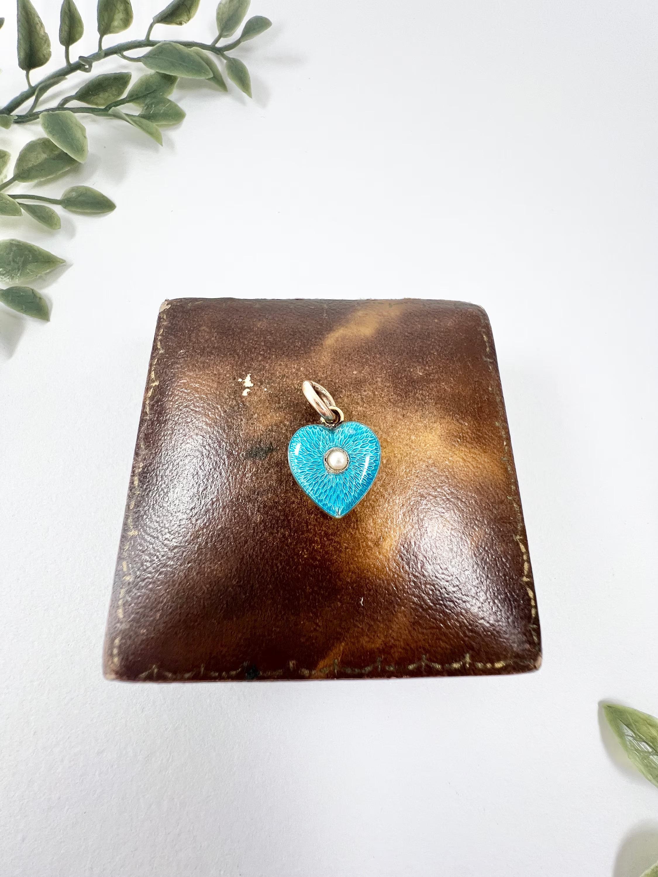 Antique Heart Pendant 

15ct Gold Tested

Circa 1890

This exquisite Victorian pendant exudes elegance and charm with its heart-shaped design and intricate details. Made of 15ct gold, it features a stunning blue enamel finish on both sides that adds