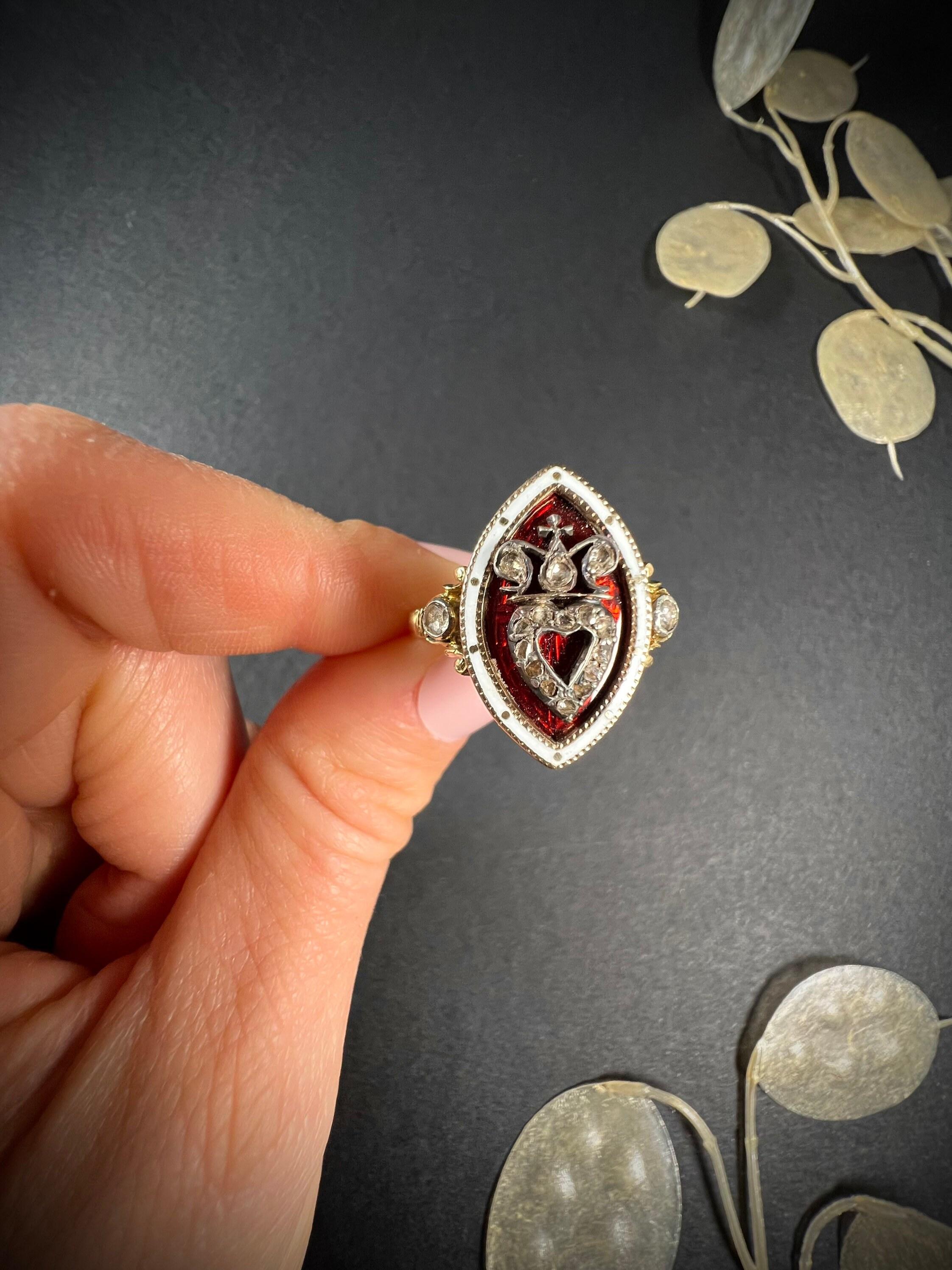 Antique Marquise Ring 

15ct Gold Tested 

Circa 1850

Fabulous, early Victorian ring. Beautiful marquise/navette shaped, decorated with gorgeous red & white enamel which is in perfect condition. The centre of the ring features a beautiful, natural