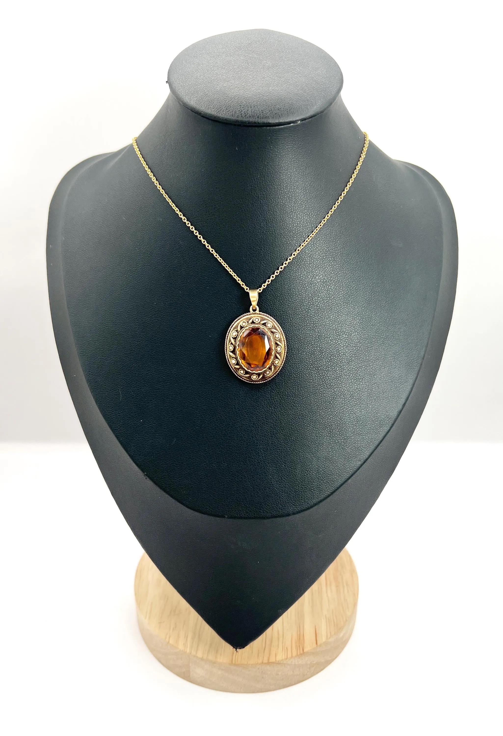 Antique Gold Locket

15ct Gold

Circa 1870

*THE CHAIN IS SOLD SEPARATELY

This exquisite 15ct gold Victorian locket is an elegant piece that beautifully captures the essence of its era. The locket is oval-shaped and features a stunningly faceted