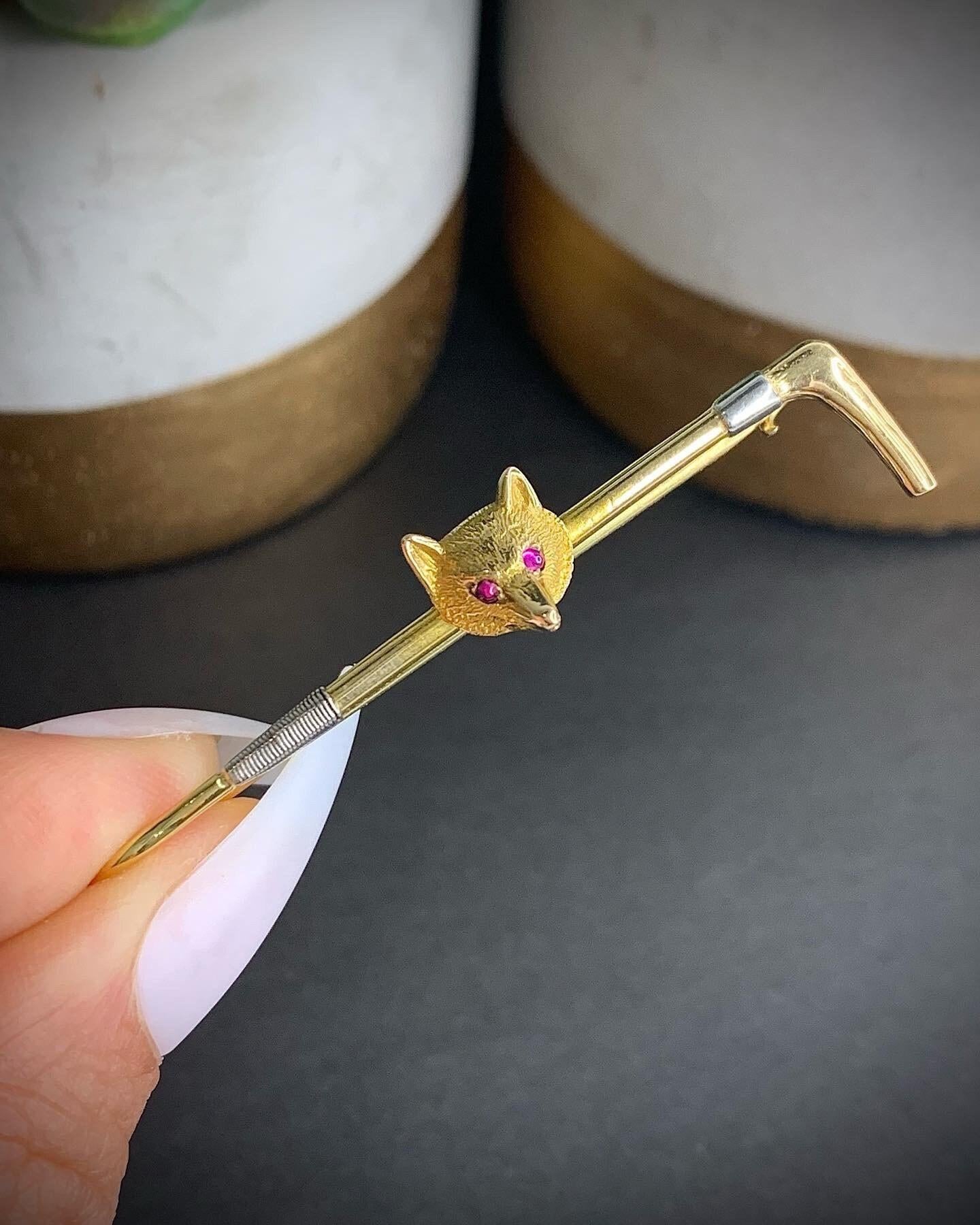 Gold Fox Brooch 

15ct Gold 

Victorian Circa 1880

Two Colour Gold Riding Crop Featuring a Gorgeous Little Fox’s Head, Set with Two Beautiful Little Ruby Eyes

Weight Approx 4.8g

Brooch Measures Approx 50mm Across
Foxes Head Approx 8mm 

All of