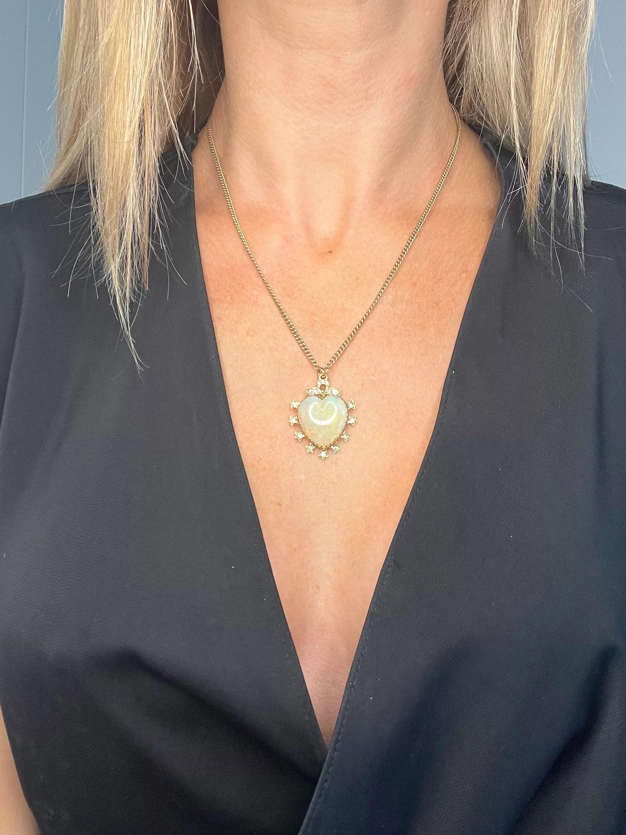 Vintage Heart Pendant

15ct Gold Stamped 

Circa 1880

The most fabulous, Victorian heart pendant. Set with a lovely sized, heart shaped, natural opal. Set in 15ct gold with a diamond set- bow shaped bail & natural diamond points all the way around