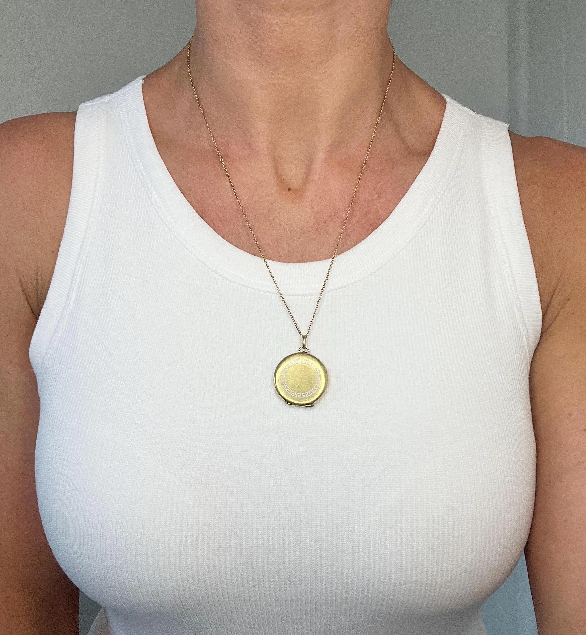 Women's or Men's Antique 15ct Yellow Gold, Edwardian era Greek Key White Enamel Round Locket For Sale