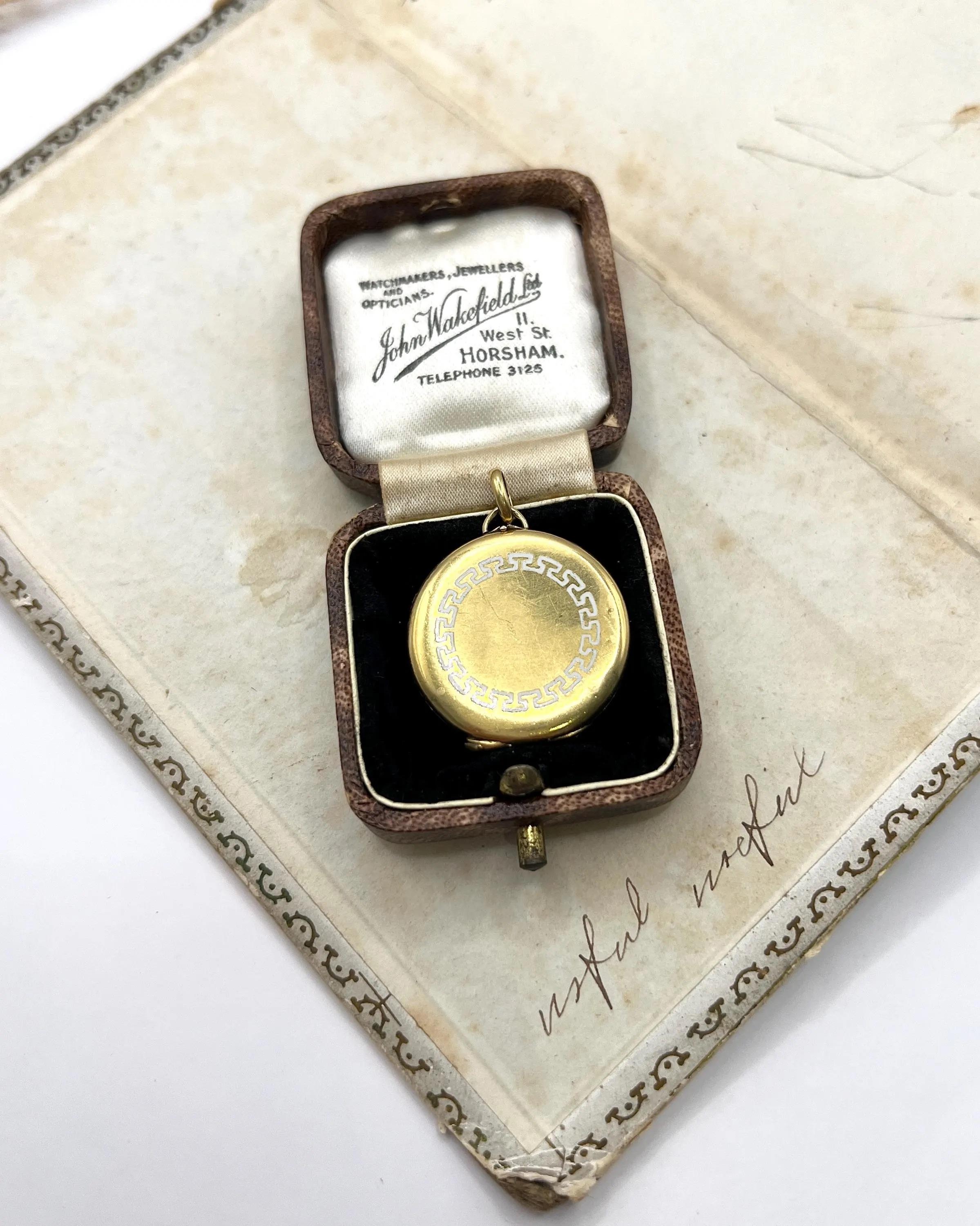 Antique 15ct Yellow Gold, Edwardian era Greek Key White Enamel Round Locket For Sale 4
