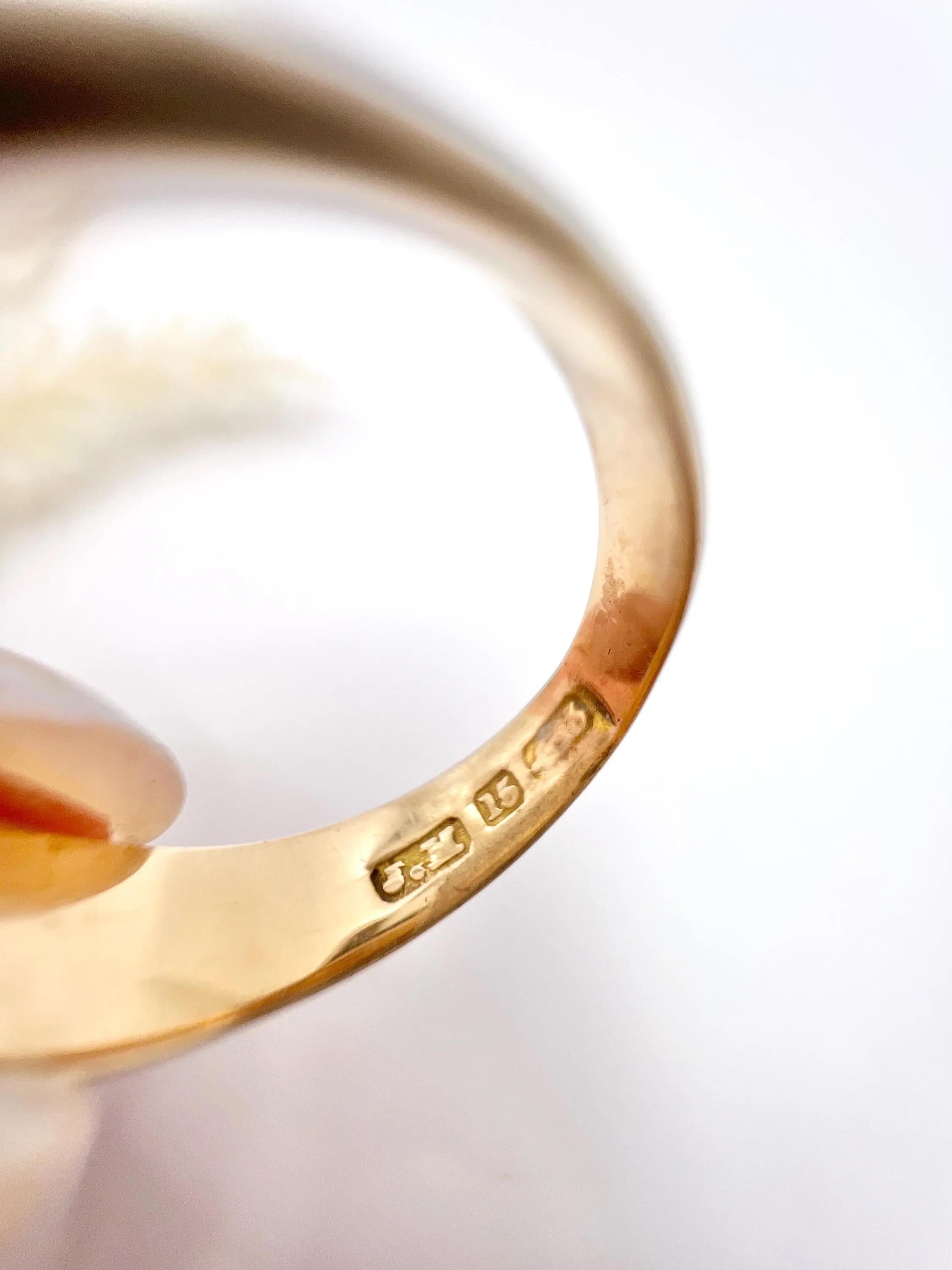 Antique Band Ring 

15ct Gold 

Makers Mark J K 

Circa 1910

This exquisite Edwardian band is crafted from 15ct gold and showcases five natural seed pearls. With its stunning design and meticulous craftsmanship, this gypsy ring is a timeless symbol