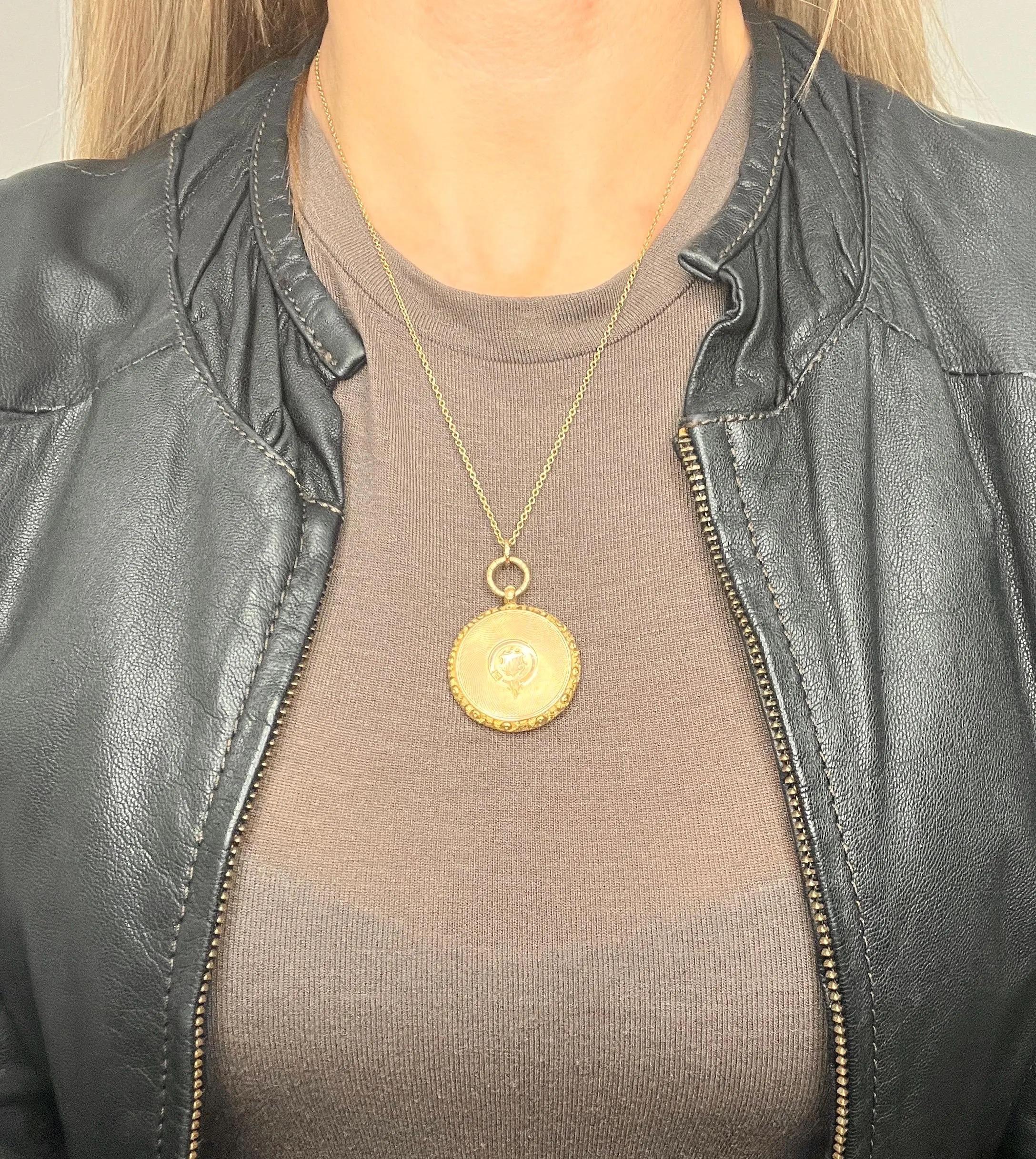 Antique Gold Locket 

15ct Yellow Gold Stamped

Circa 1865

* THE CHAIN IS SOLD SEPARATELY.

Step back in time with this exquisite early Victorian pocket watch locket, crafted from 15ct yellow gold. This fabulous piece exudes a sense of history and