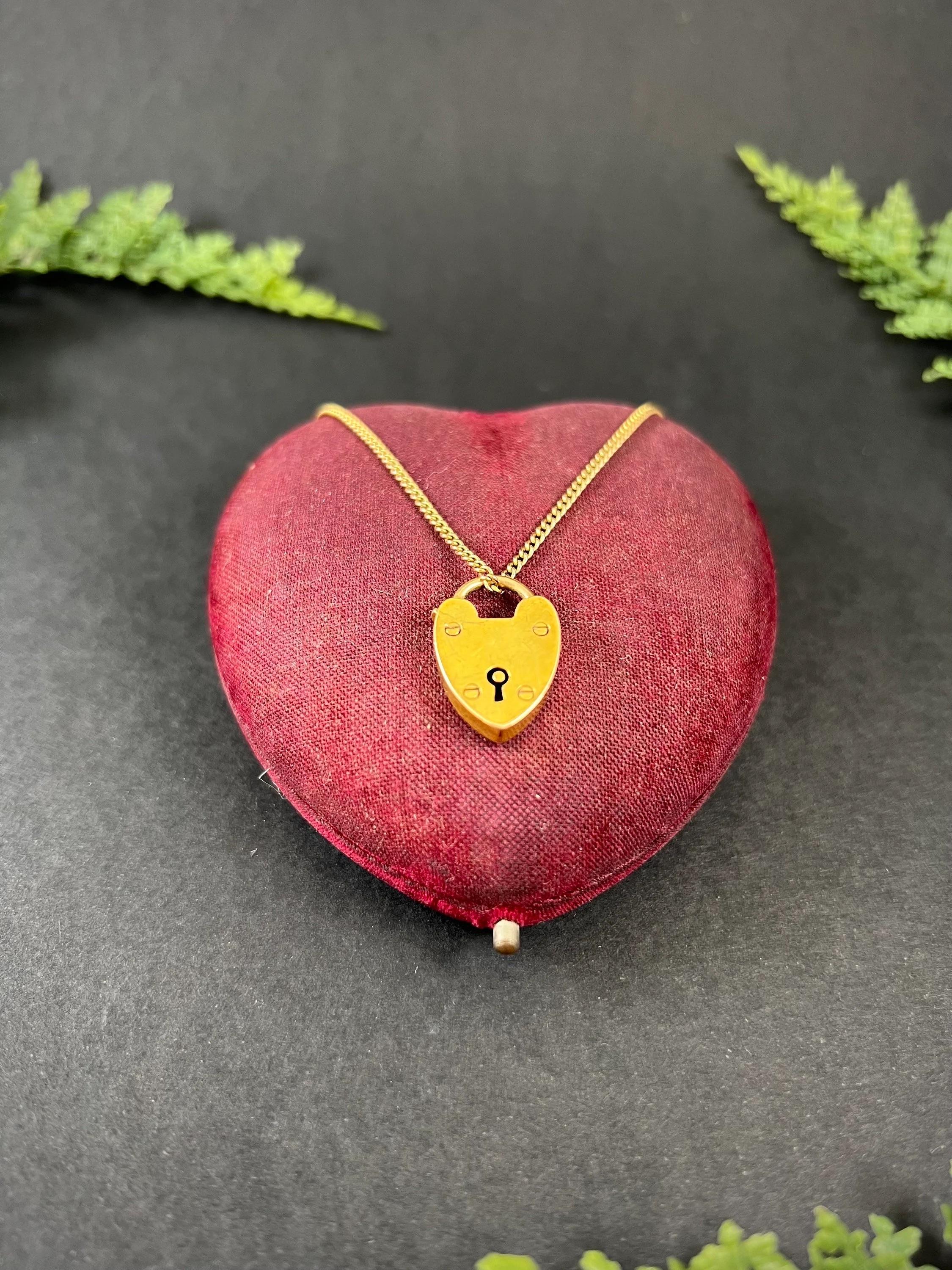 Antique Gold Padlock

15ct Yellow Gold Stamped

Circa 1880

Weight 3.3g

This lovely antique heart padlock is crafted from 15ct rose gold and is stamped for authenticity, ensuring its high-quality craftsmanship. This versatile piece can be worn as a