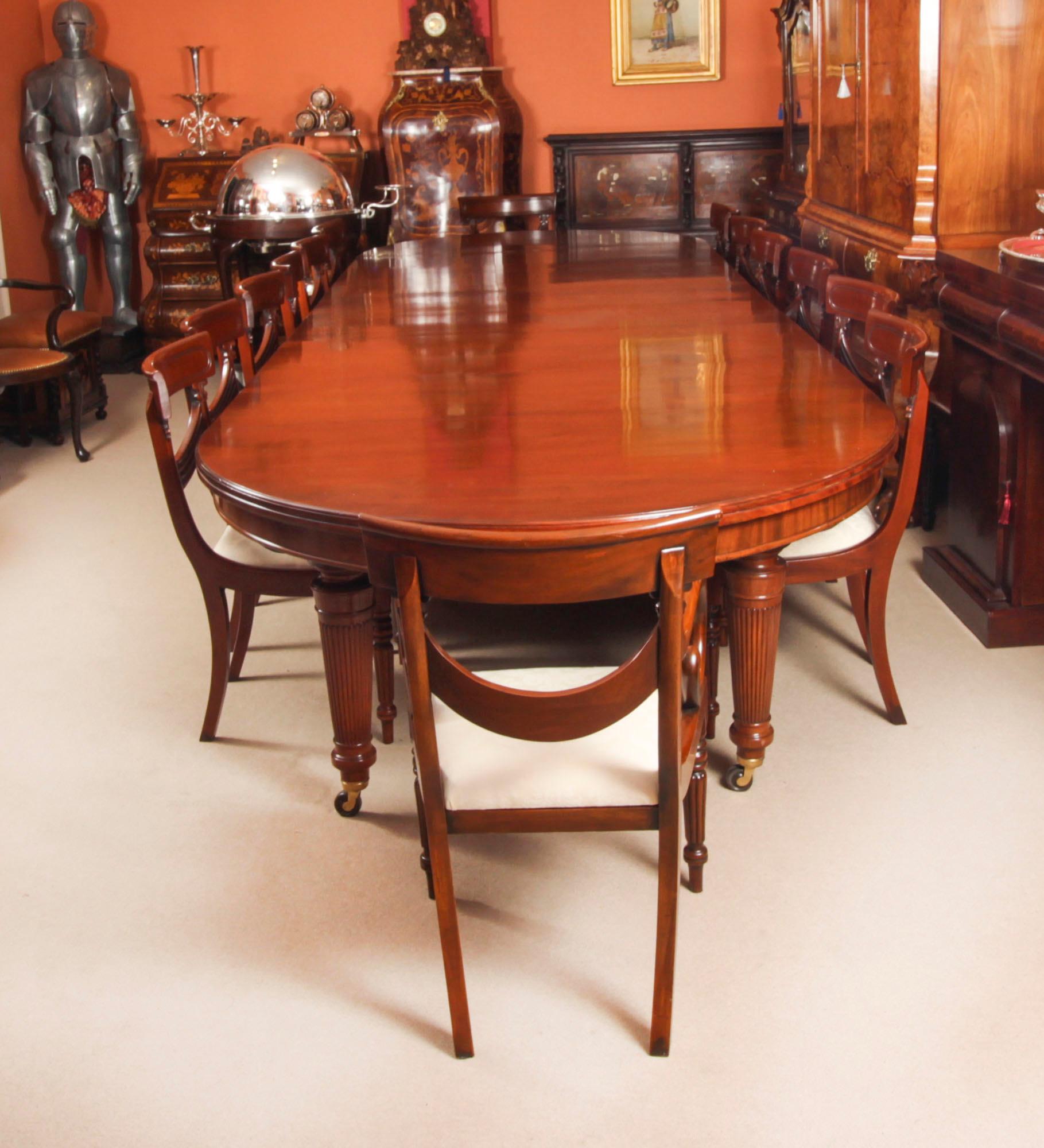 This is a beautiful dining set comprising an antique late Victorian extending dining table by the renowned Victorian cabinet makers, Edwards and Roberts, circa 1880 in date, and a set of sixteen Regency Revival dining chairs.

This amazing table can