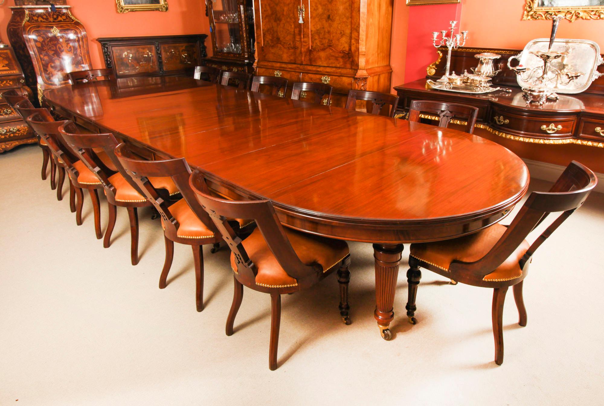 This is a beautiful antique late Victorian mahogany extending dining table by the renowned Victorian cabinet makers, Edwards and Roberts, and circa 1880 in date.

This amazing table can seat sixteen people in comfort and has been hand-crafted from