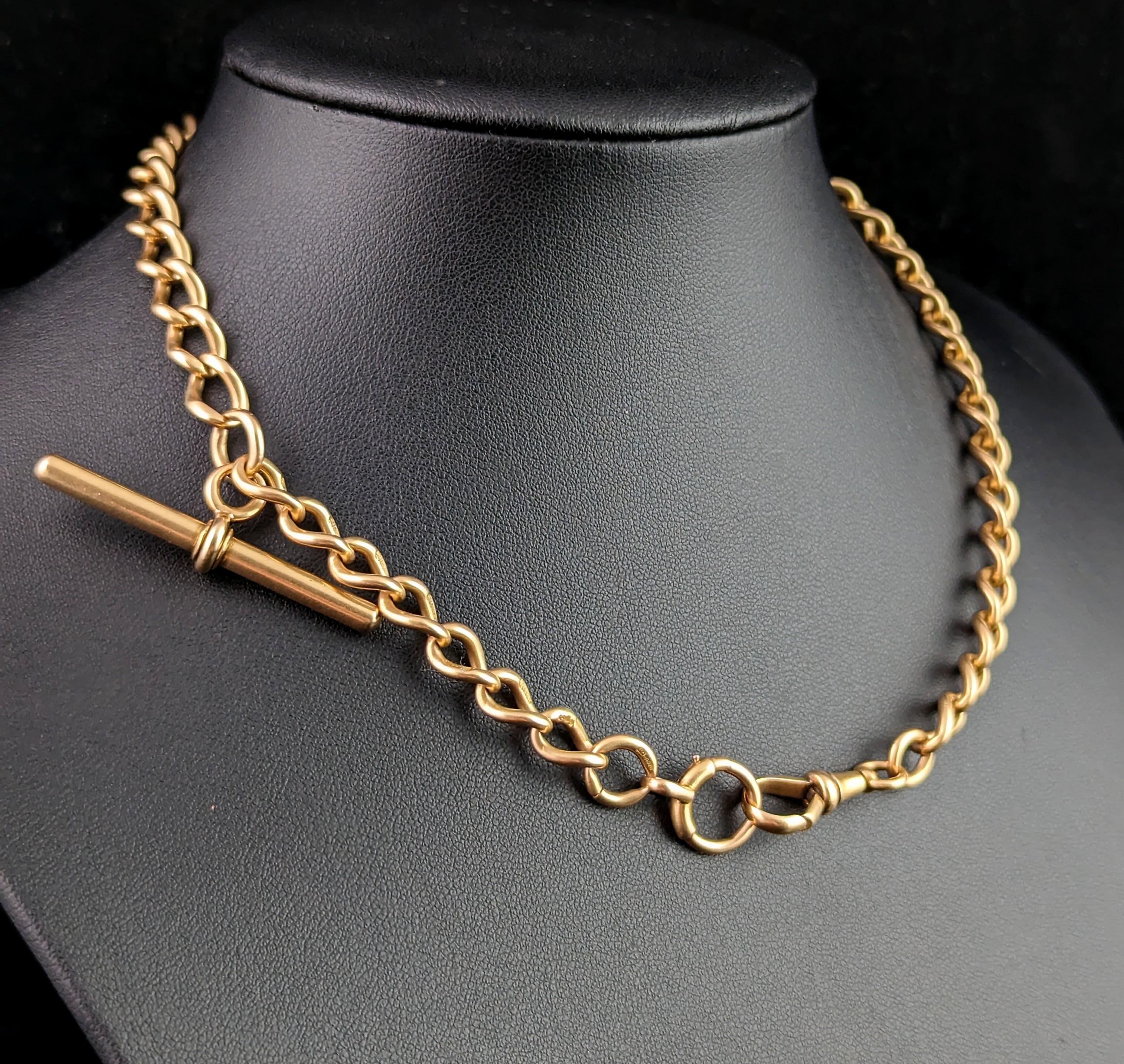 You can't help but fall in love with this impeccable antique, late Victorian era 15kt gold Albert chain.

A beautifully designed chain with elongated open curb links giving it a sleek design and the fact that this chain is crafted in rich yellow