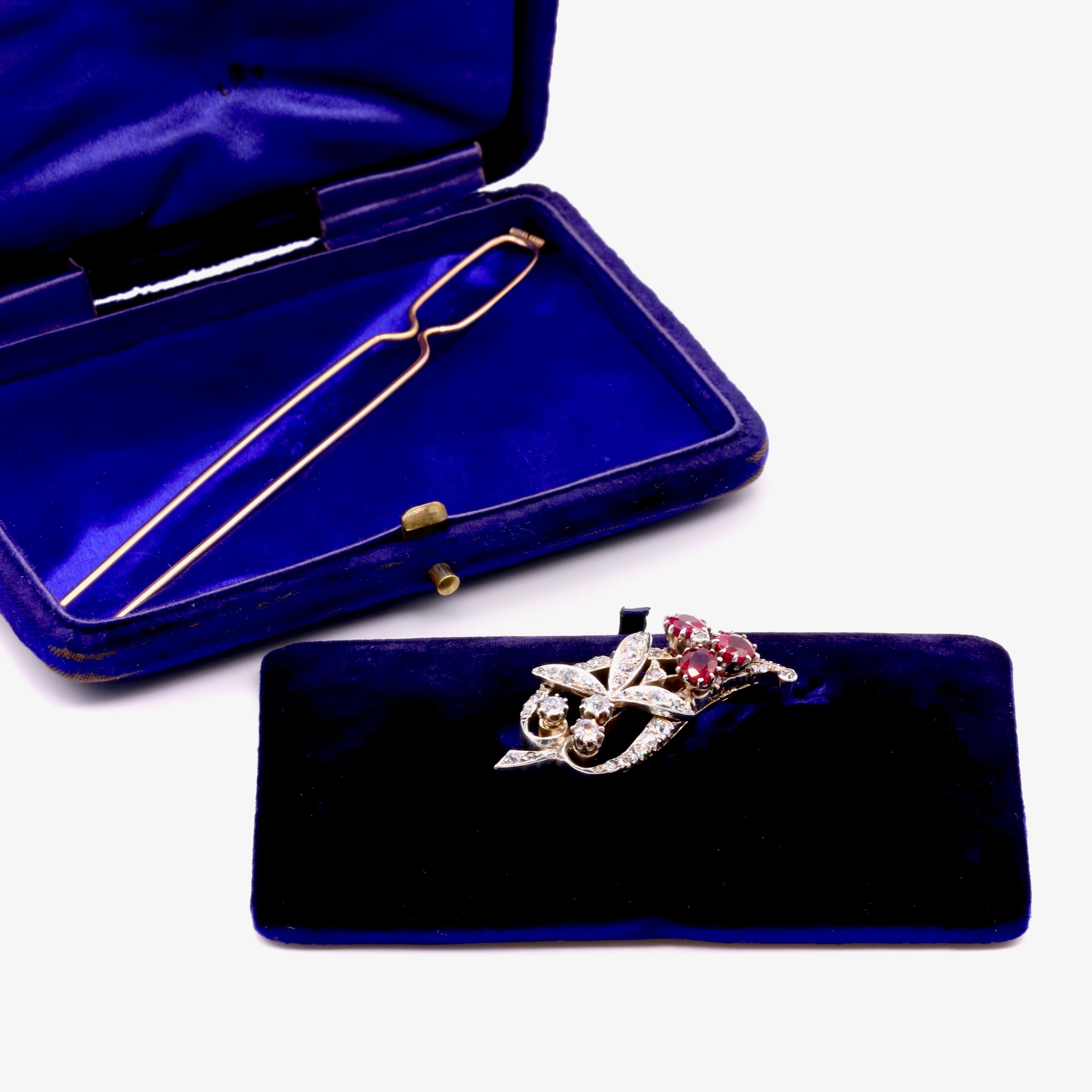 An antique ruby, diamond, yellow gold, and silver brooch, comprising three oval shaped rubies, and forty-two old cut diamonds, in 15 karat yellow gold and silver. 

My favourite thing about this Antique 15K Yellow Gold and Silver Ruby and Diamond