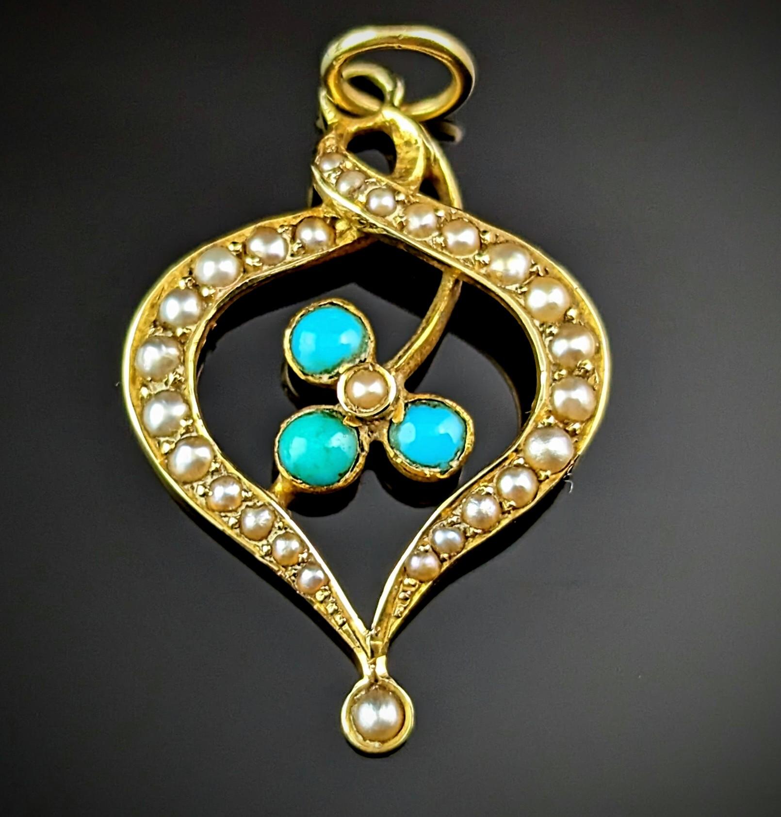 This sweet and dainty pendant is the perfect choice for a fine antique gold chain.

It is a delightful little piece with scrolling shapes in openwork 15ct yellow gold with a shamrock design to the centre.

The shamrock or clover is set with tiny