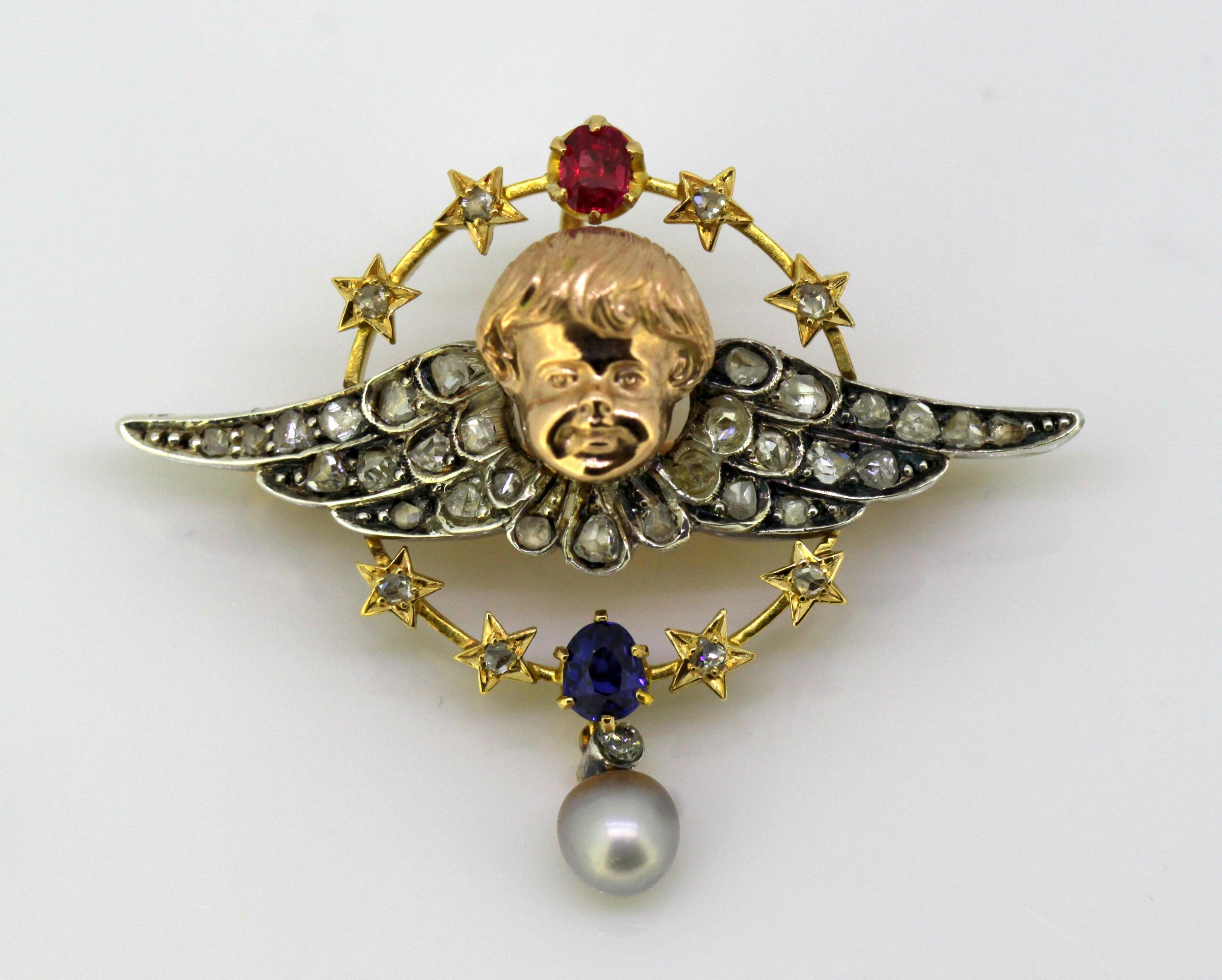 Antique 15k yellow gold and sterling silver brooch / pendant with ruby, blue sapphire, south sea pearl and diamonds.

Maker : W. Rummel

Made in Prague Circa 1880's

Approx Dimensions - 
Size : 3.6 x 3 x 1.3 cm
Weight : 9 grams

Diamonds - 
Cut :