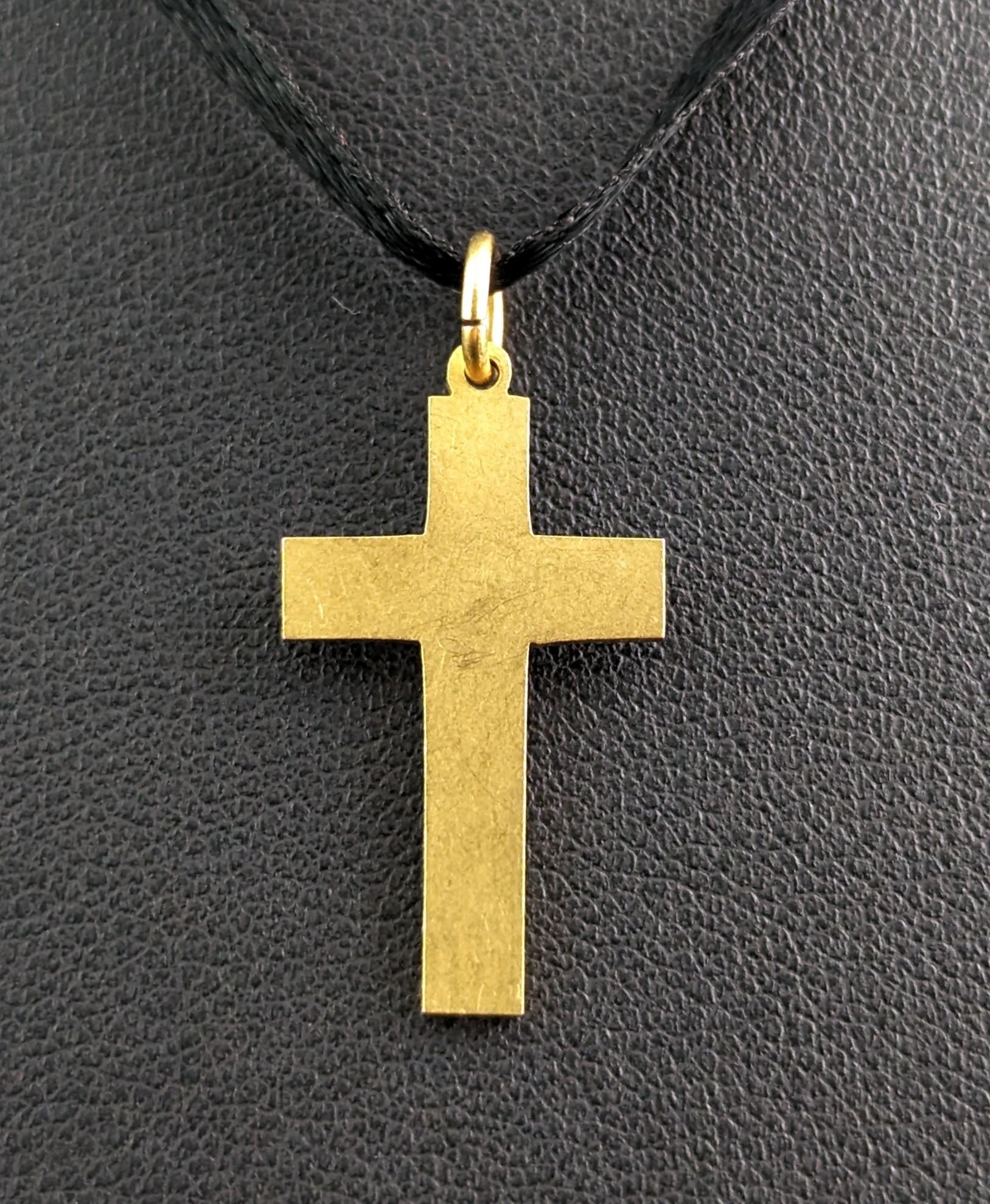 This sweet antique, 15ct yellow gold Cross pendant is truly unique being hand cut by master jewellers from the past.

This gives it such a beautiful touch as the craftsmanship of the original jeweller can still be felt in the piece.

It is a dainty