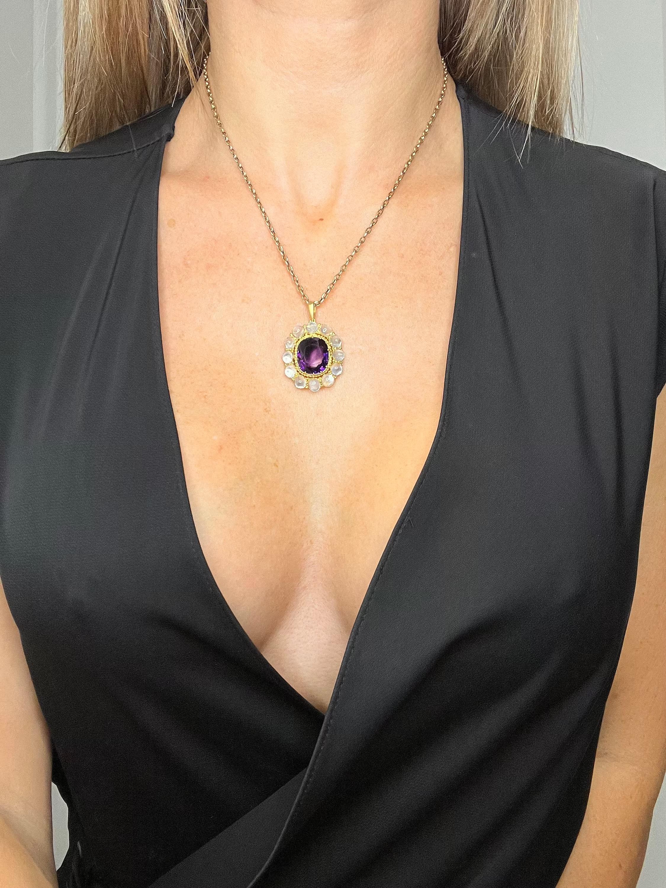 Amethyst & Moonstone Pendant

15ct Gold Tested

Circa 1850 

This large, oval, faceted Amethyst Victorian pendant is a true beauty. The Amethyst is framed in 15ct yellow gold, which adds a touch of elegance to it. The border of 12 Moonstones gives