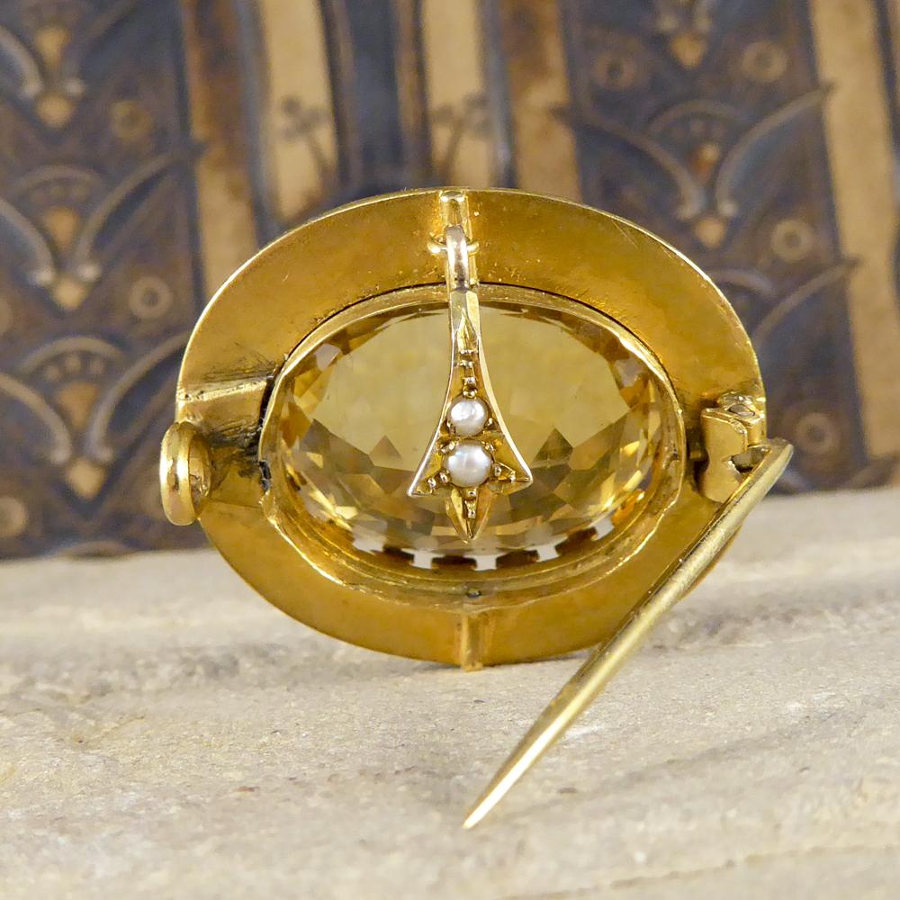 Oval Cut Antique 16 Carat Citrene and Cultured Pearl Brooch in 15 Carat Yellow Gold