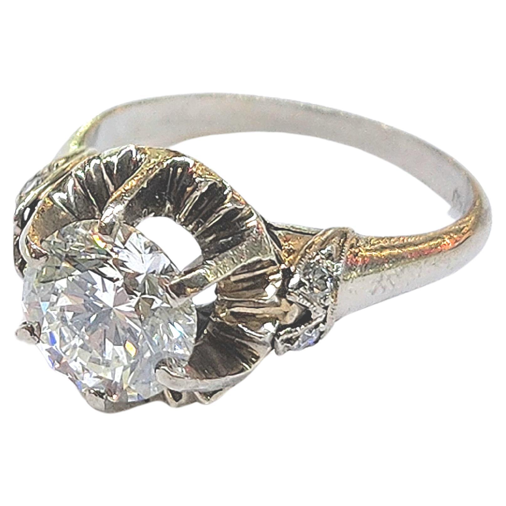 Art deco era 1920s white gold ring centered with large 1.60 carat european round cut diamond H color white vvs2 clearity excellent cut and spark in fine detailed ring work hall marked 750 for 18k gold finest