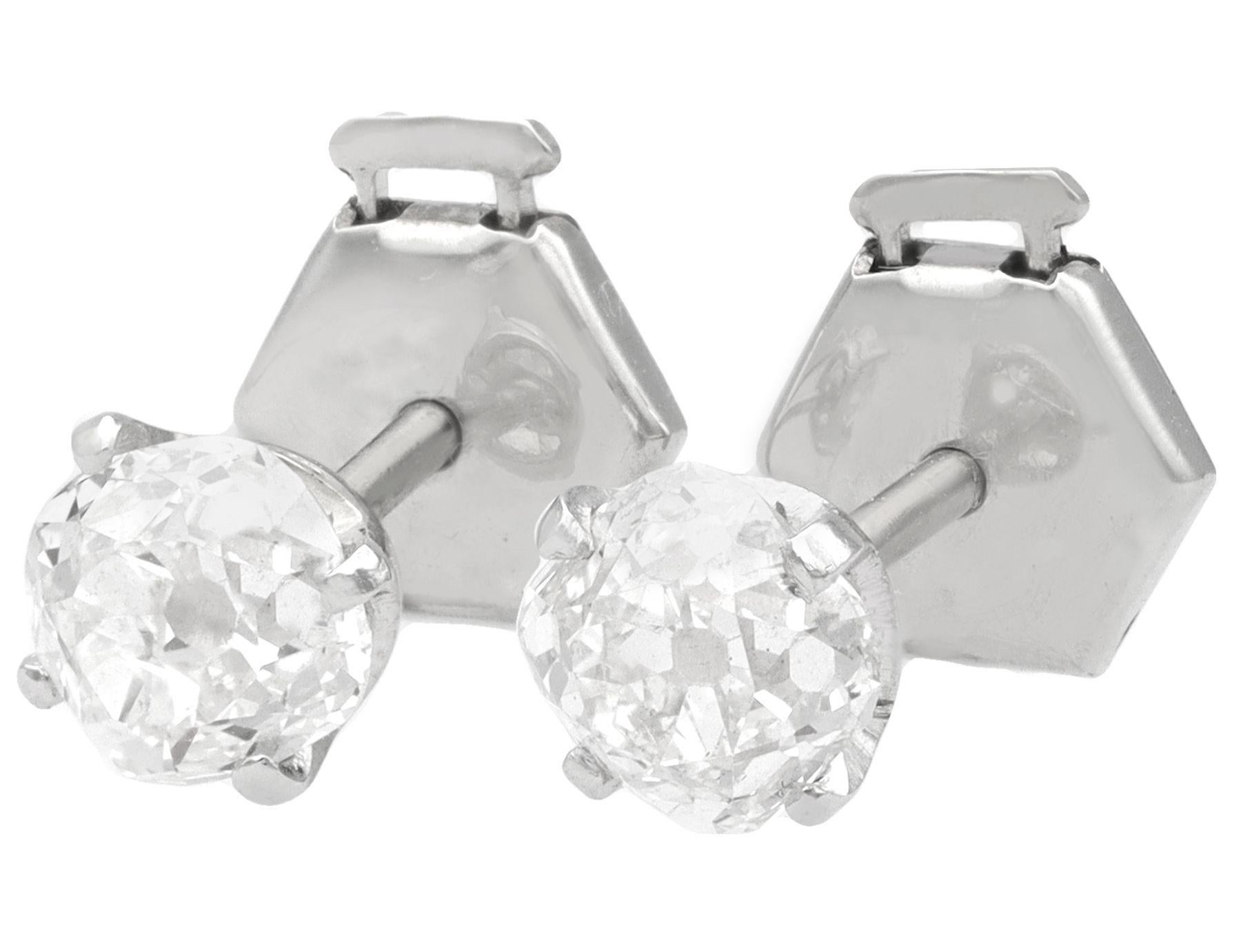 A fine and impressive pair of antique 1.61 carat diamond and contemporary 18 karat white gold, platinum set stud earrings; part of our diverse jewelry and estate jewelry collections

These fine and impressive diamond stud earrings have been crafted