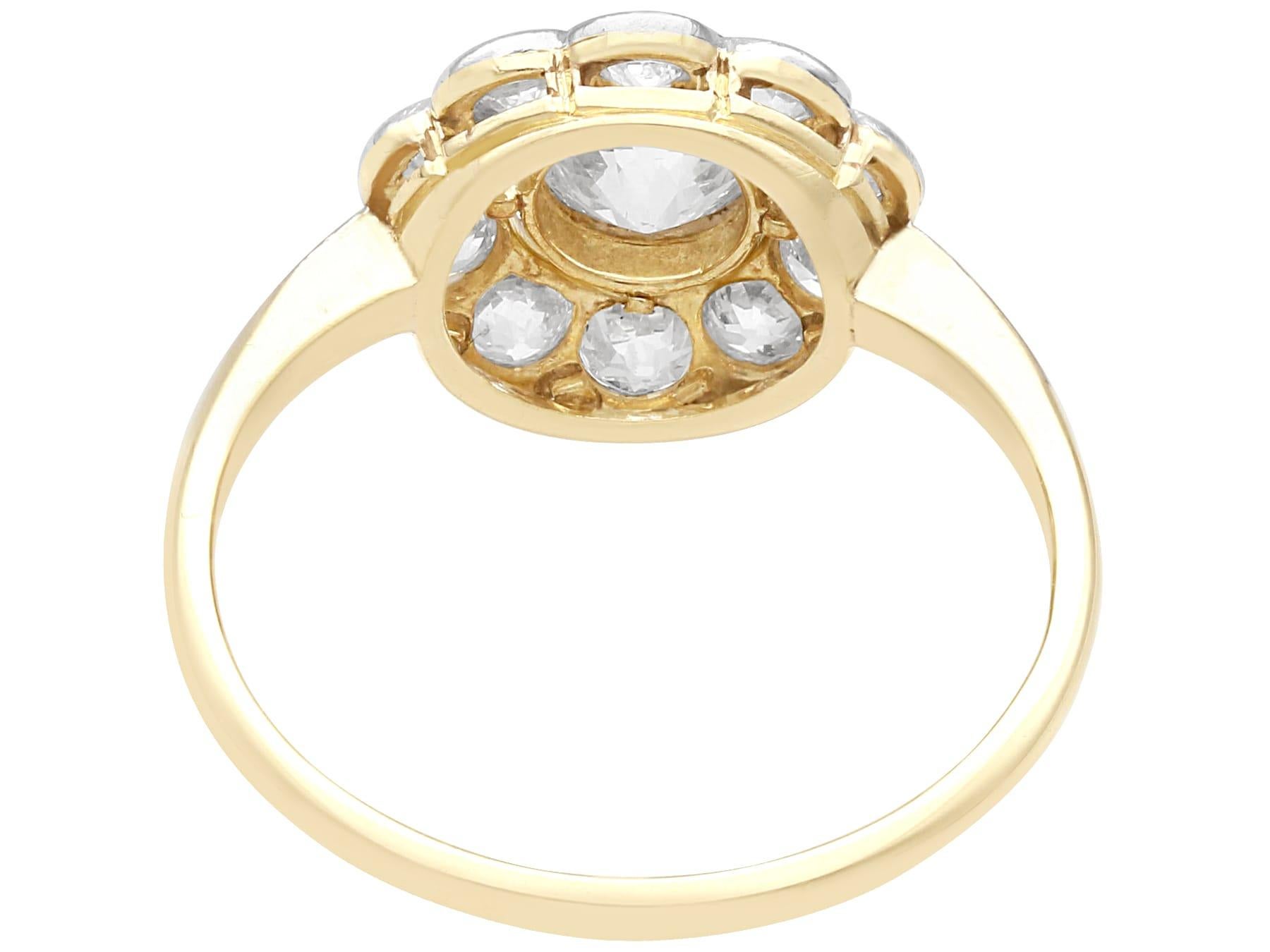Round Cut Antique 1.63 Carat Diamond and Yellow Gold Floral Cluster Ring For Sale