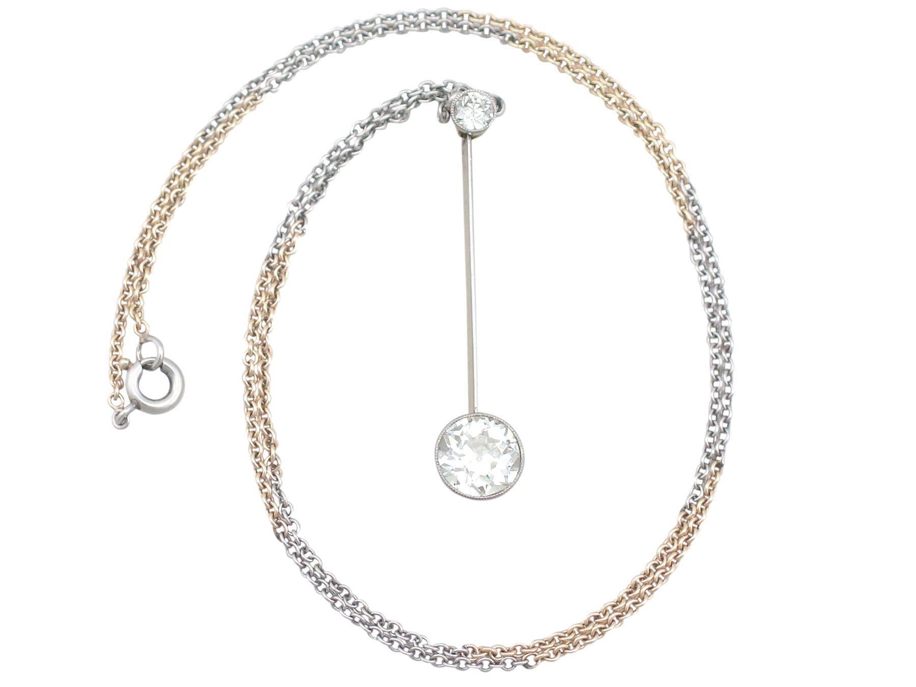 This stunning antique diamond necklace has been crafted in 15k yellow gold with a 15k white gold setting.

The necklace features a 1.42Cts old European round cut diamond individually bezel set within a millegrain decorated frame.

The feature