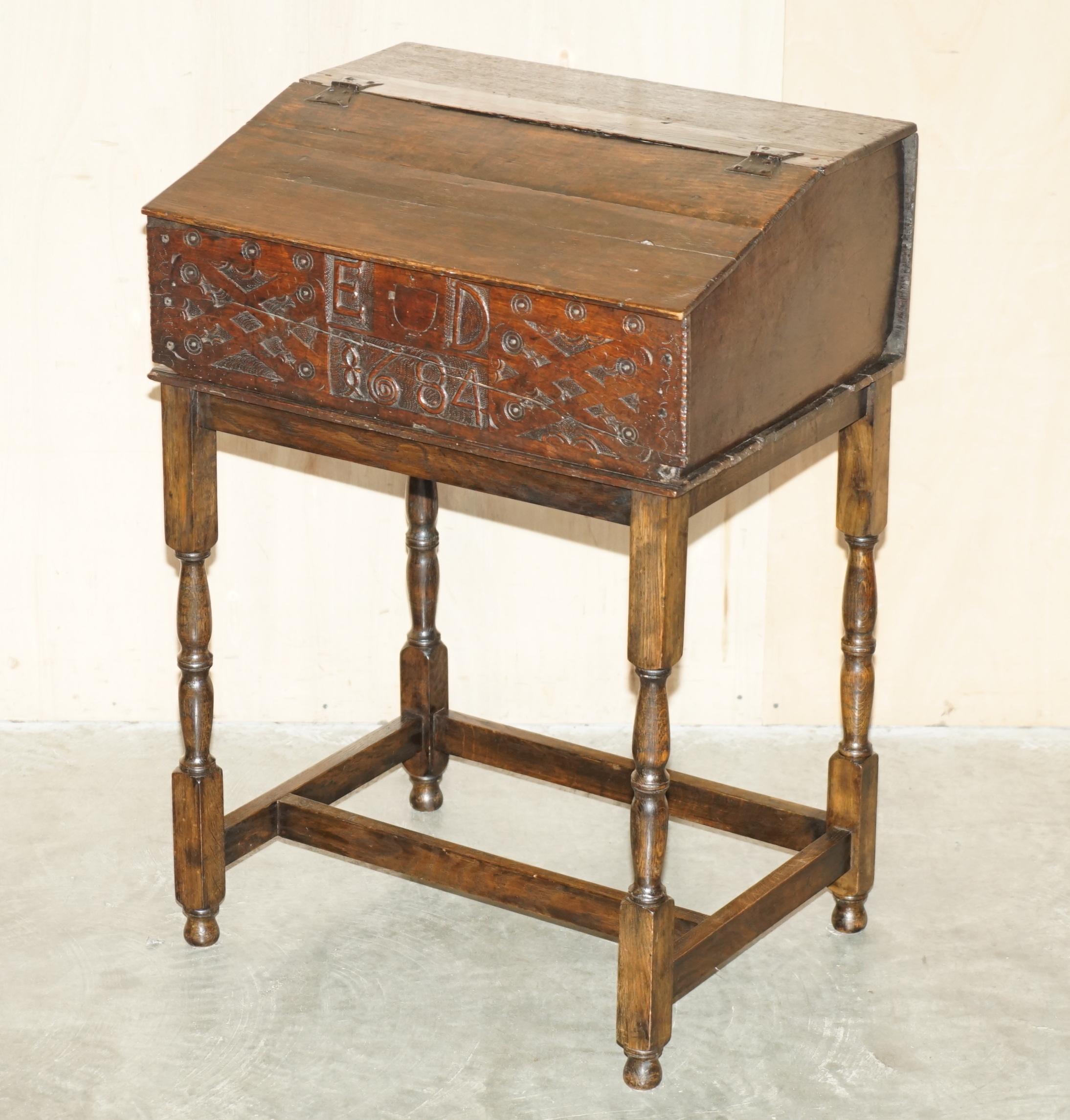 Royal House Antiques

Royal House Antiques is delighted to offer for sale this stunning, late 17th century, hand caved 1684 lift top writing work table traditionally used for bible storage 

Please note the delivery fee listed is just a guide, it