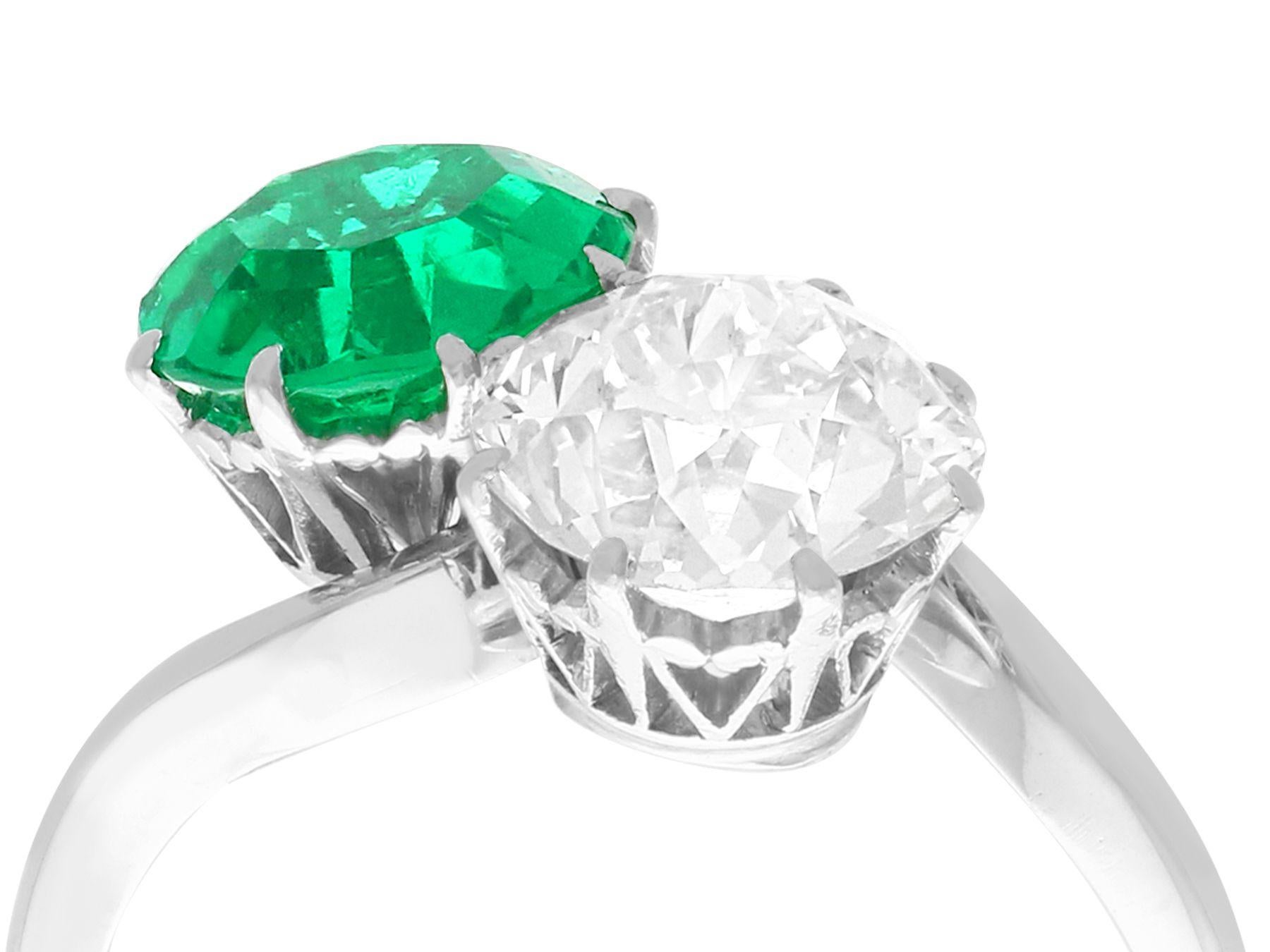 A stunning, fine and impressive antique 1.70 carat Colombian emerald, 2.18 carat diamond and platinum twist ring; part of our diverse antique jewelry and estate jewelry collections

This stunning, fine and impressive Colombian emerald and diamond
