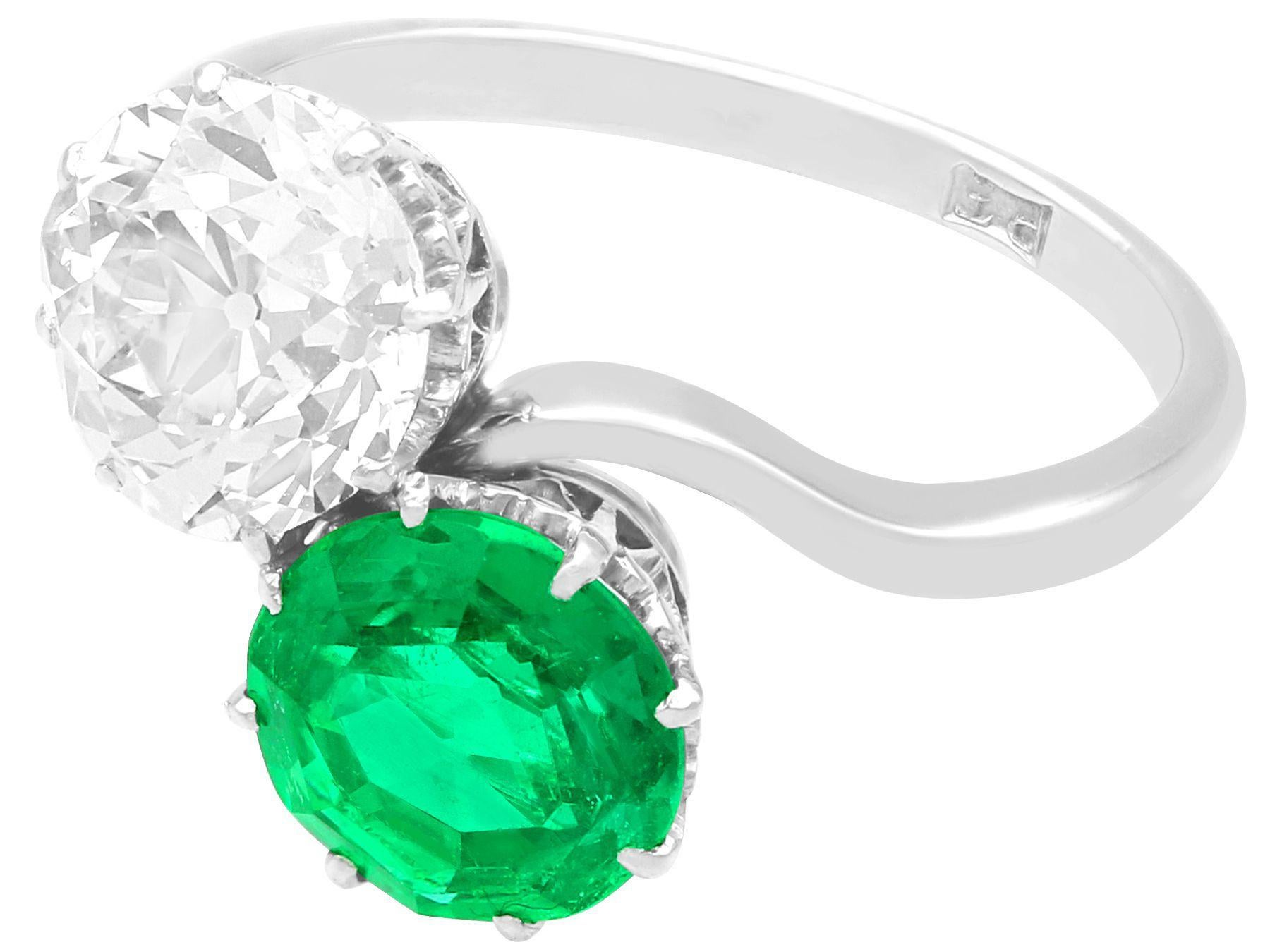 Old European Cut Antique 1.70 Carat Colombian Emerald and 2.18 Carat Diamond Platinum Twist Ring For Sale