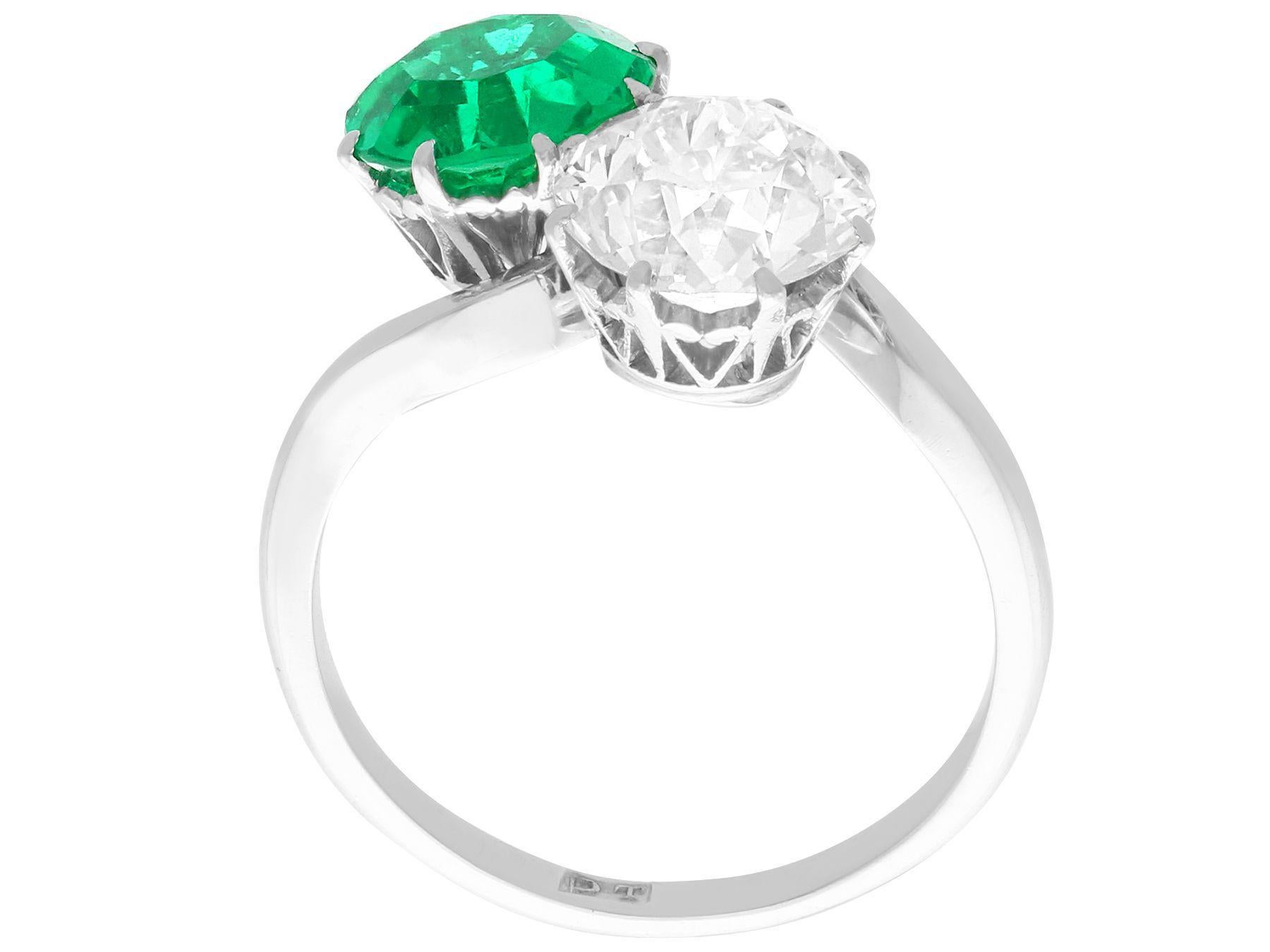 Women's or Men's Antique 1.70 Carat Colombian Emerald and 2.18 Carat Diamond Platinum Twist Ring For Sale