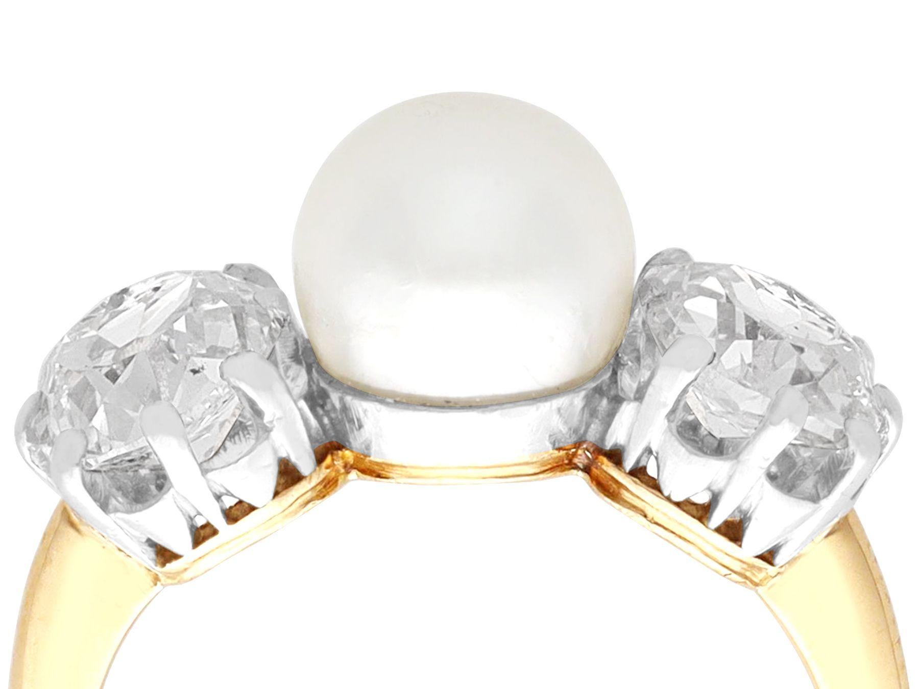 A stunning, fine and impressive 1.70 carat diamond and natural saltwater pearl, 18 karat yellow gold and platinum trilogy ring; part of our diverse antique jewellery and estate jewelry collections.

This stunning, fine and impressive antique trilogy