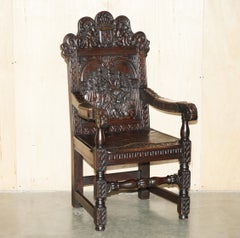 ANTIQUE 1718 DATED WILLIAM III PANEL JACOBEAN HAND CARVED ENGLISH OAK ARMCHAiR