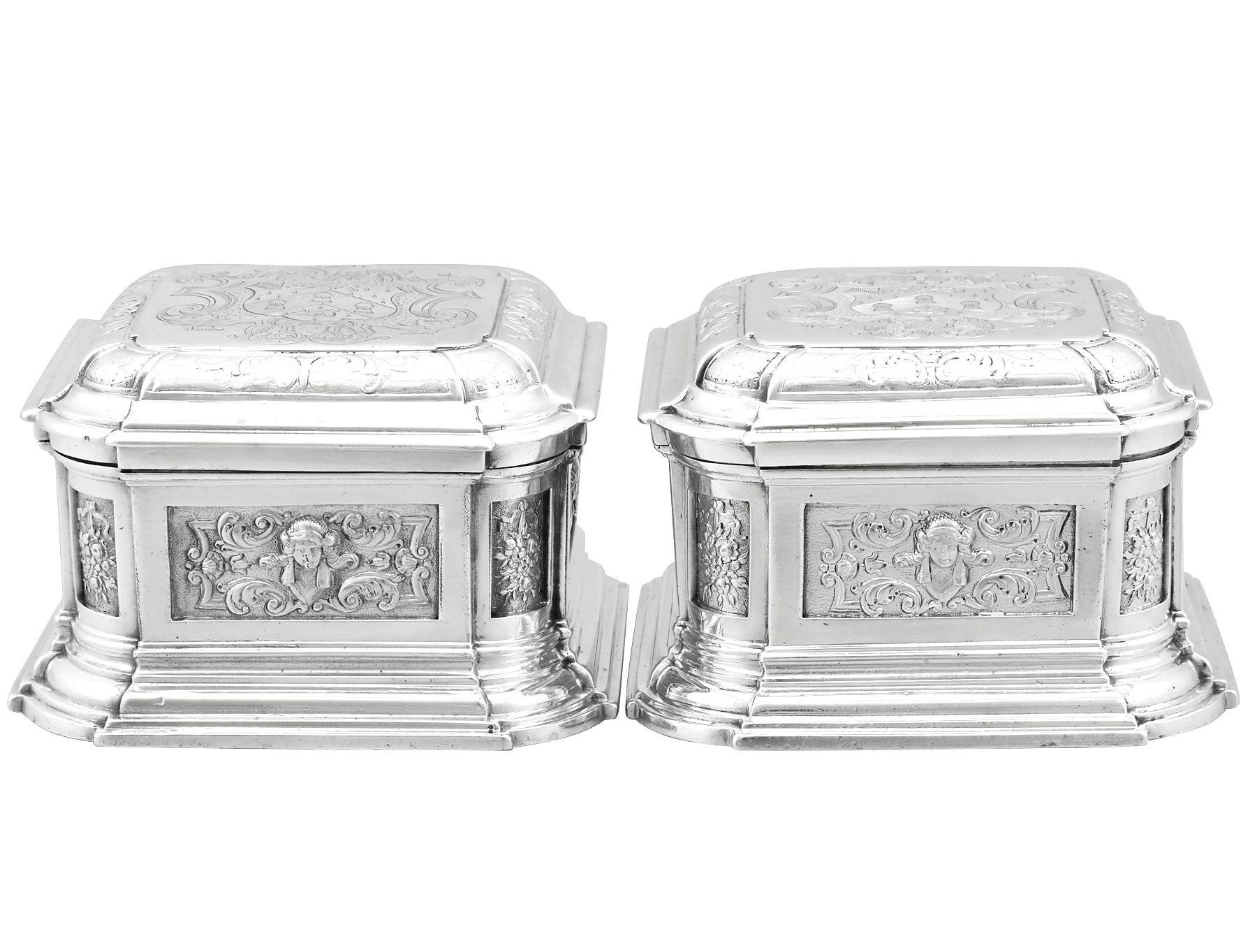 A magnificent, fine and impressive pair of antique George II English sterling silver toilet boxes; an addition to our Georgian silverware collection.
These magnificent antique George II sterling silver toilet boxes have a cut cornered square shaped