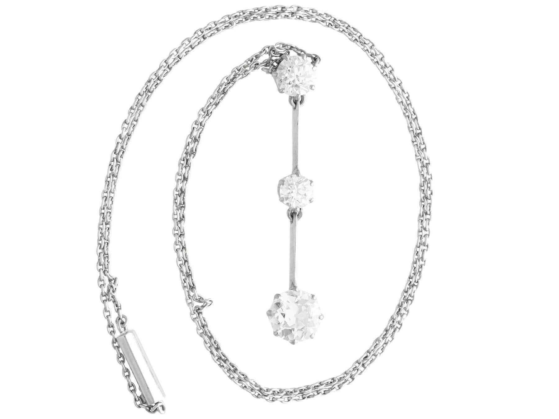 A stunning, fine and impressive antique 1.74 Carat diamond and platinum necklace; part of our diverse 1930's diamond jewelry collections.

This stunning antique diamond necklace has been crafted in platinum.

The necklace features a stunning
