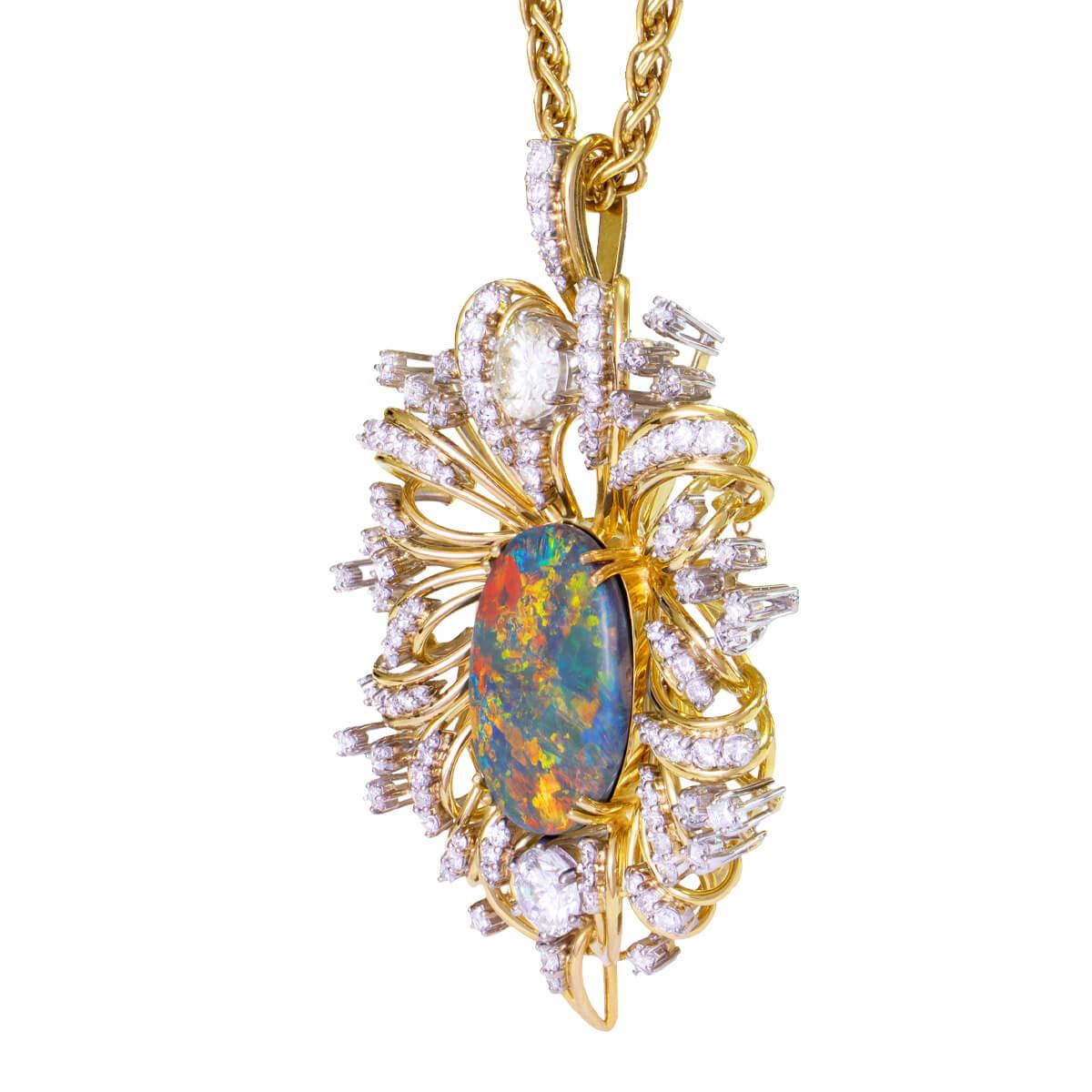 A truly timeless piece, the Opal Blossom, was created in the 1930s. This spectacular piece is a pendant and also a brooch. Centred with a heart of 17.7ct black opal and set in an 18K gold and palladium Chrysanthemum setting featuring over 8ct of
