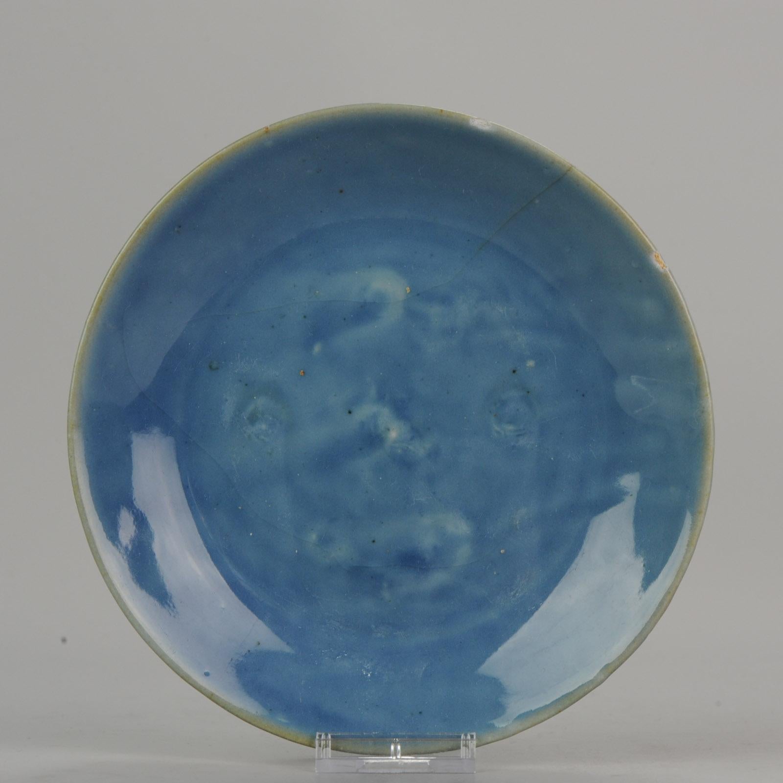 Description
A very beautiful plate, rare monochrome blue ground. Great study material.

Condition
Overall condition; 2 large crackle line in central plate, 1 running out in a hairline. 1 more crackle line from base rim. also 2 small chips. Size: