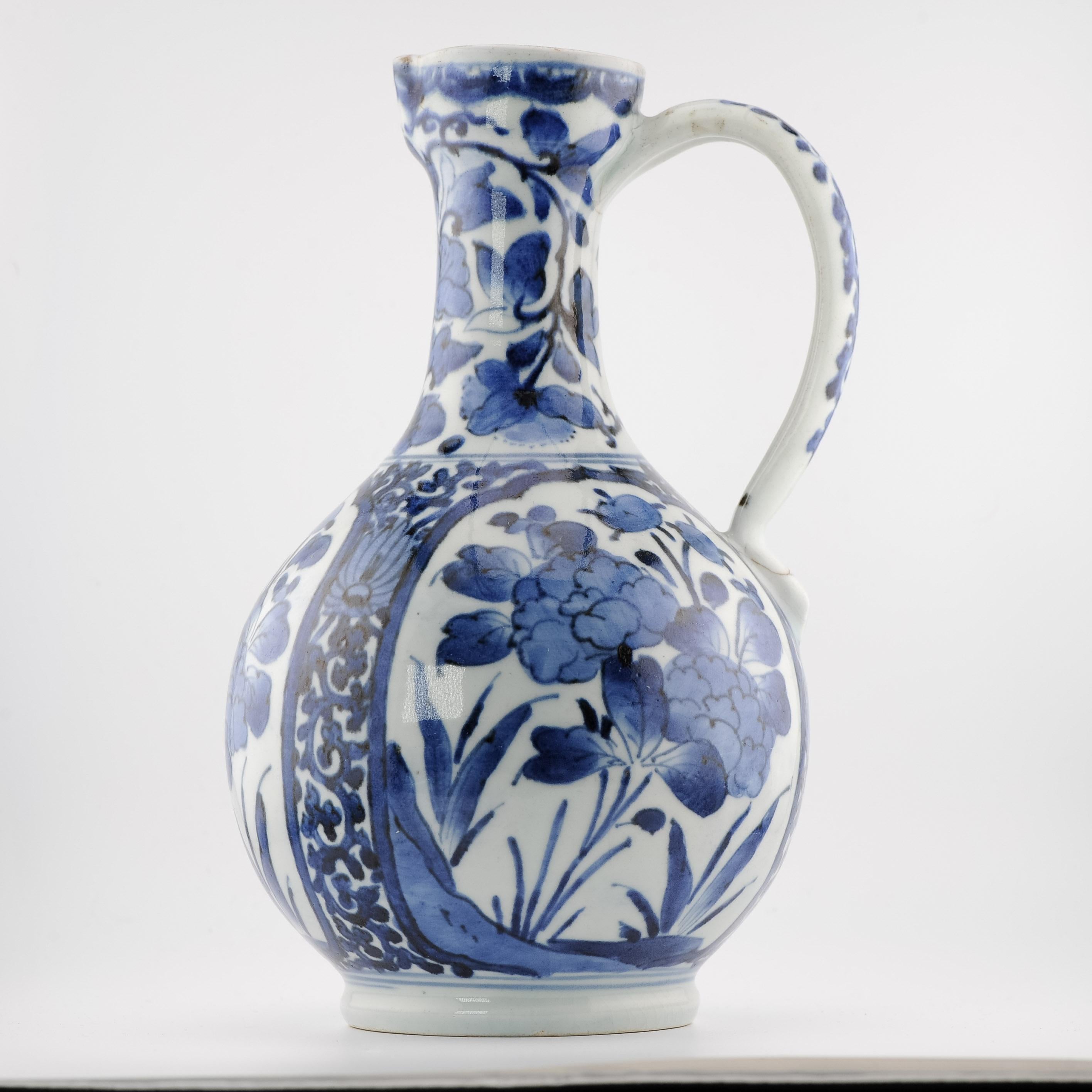 Description

Nice & Beautiful Arita Japanese Porcelain Jug . Scene with flowers.

This 17th Century Japanese Export Porcelain Jug or Ewer, Arita Kilns c.1670-1690 is painted in lovely blue and white. The painting style is a mixture of Japanese, with