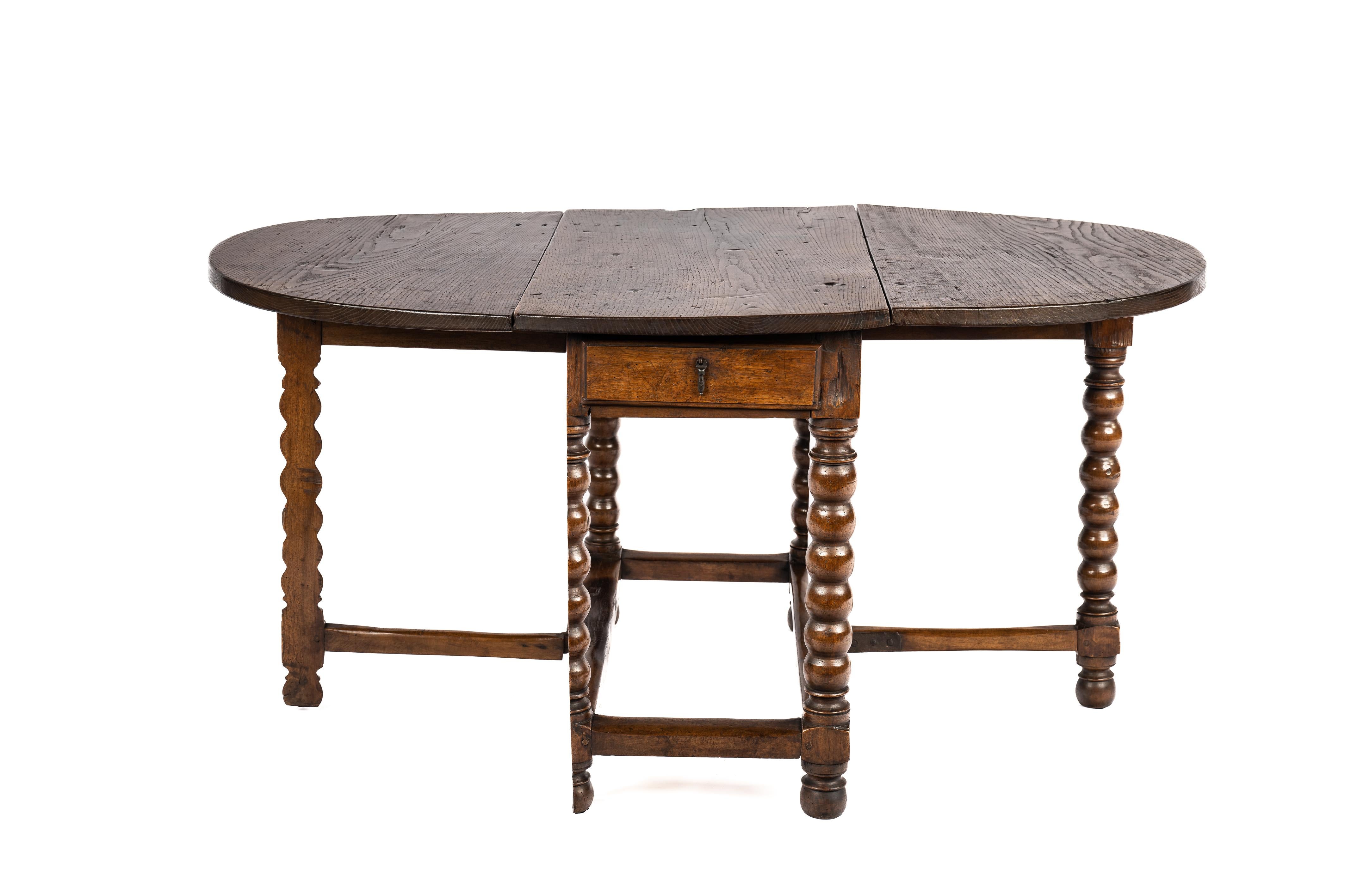 17th Century Antique 17h Century Spanish Chestnut Warm Brown Gateleg or Dropleaf Table For Sale