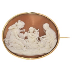 Antique 17K Yellow Gold Cherub and Three Women Shell Cameo Brooch