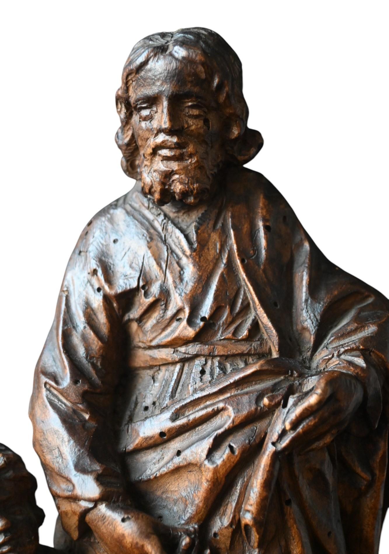 Hand-Carved Baroque Walnut Sculpture Of Saint Joseph And The Christ Child, Early 18th C. For Sale