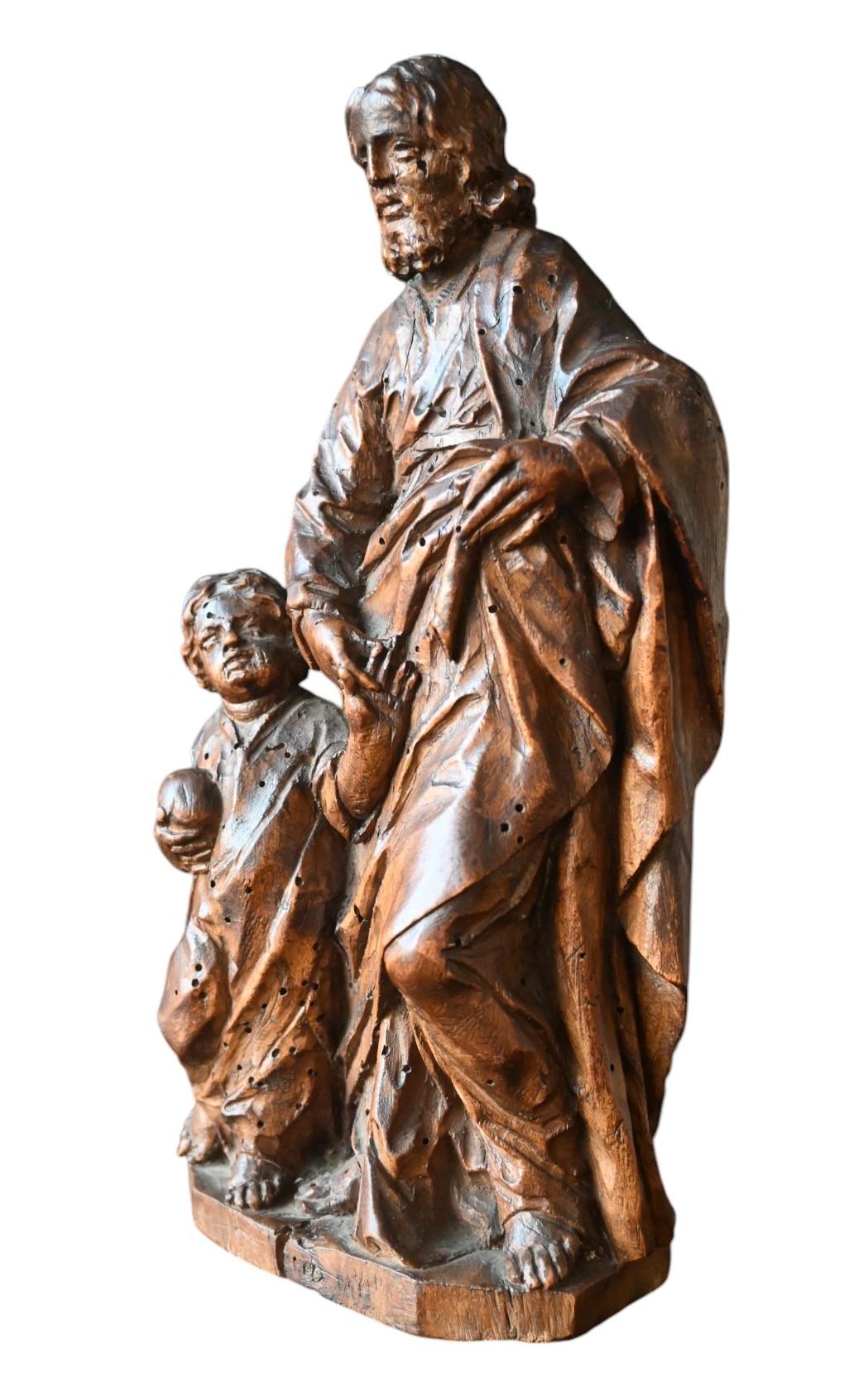 18th Century Baroque Walnut Sculpture Of Saint Joseph And The Christ Child, Early 18th C. For Sale