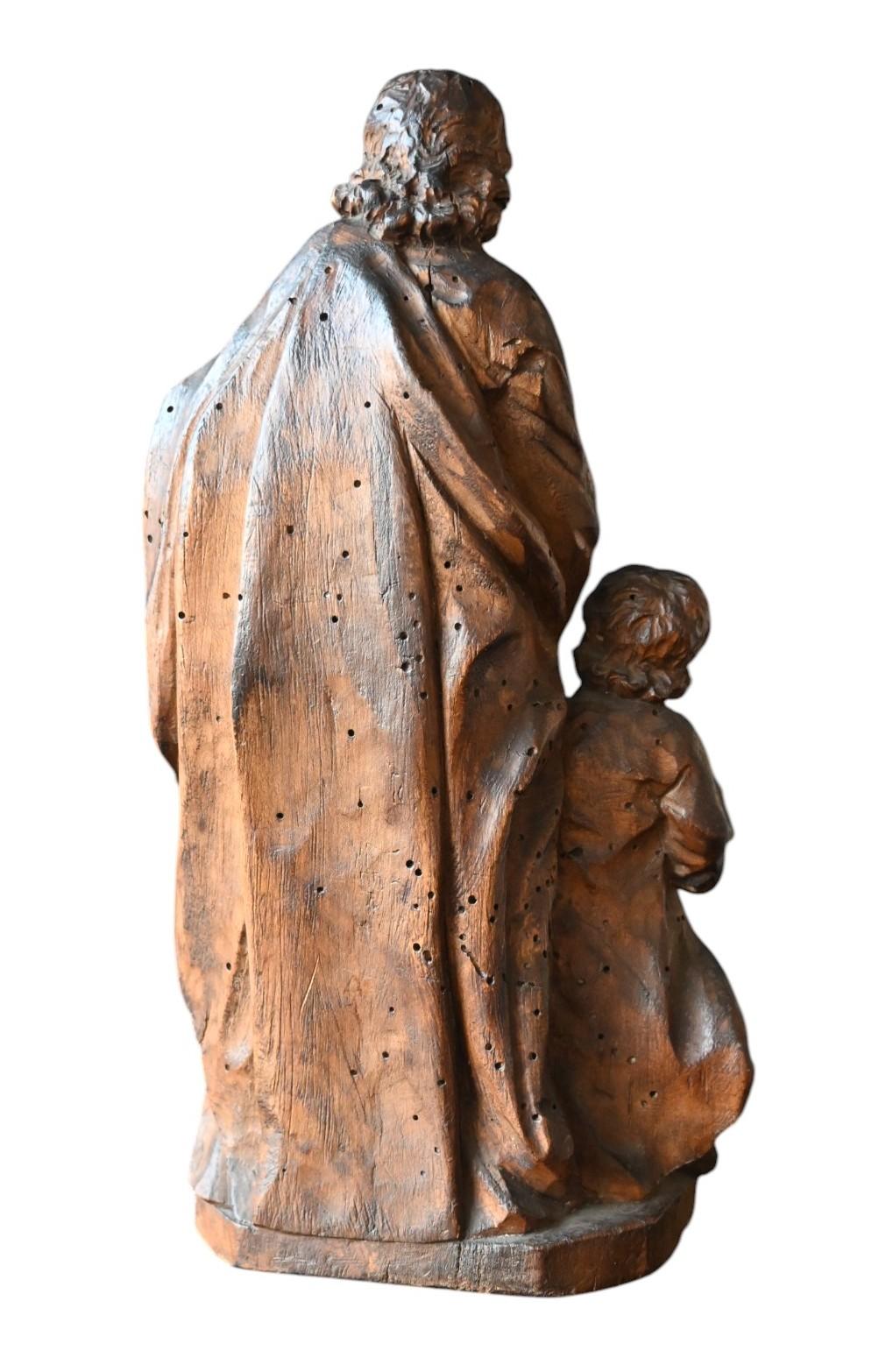 Wood Baroque Walnut Sculpture Of Saint Joseph And The Christ Child, Early 18th C. For Sale
