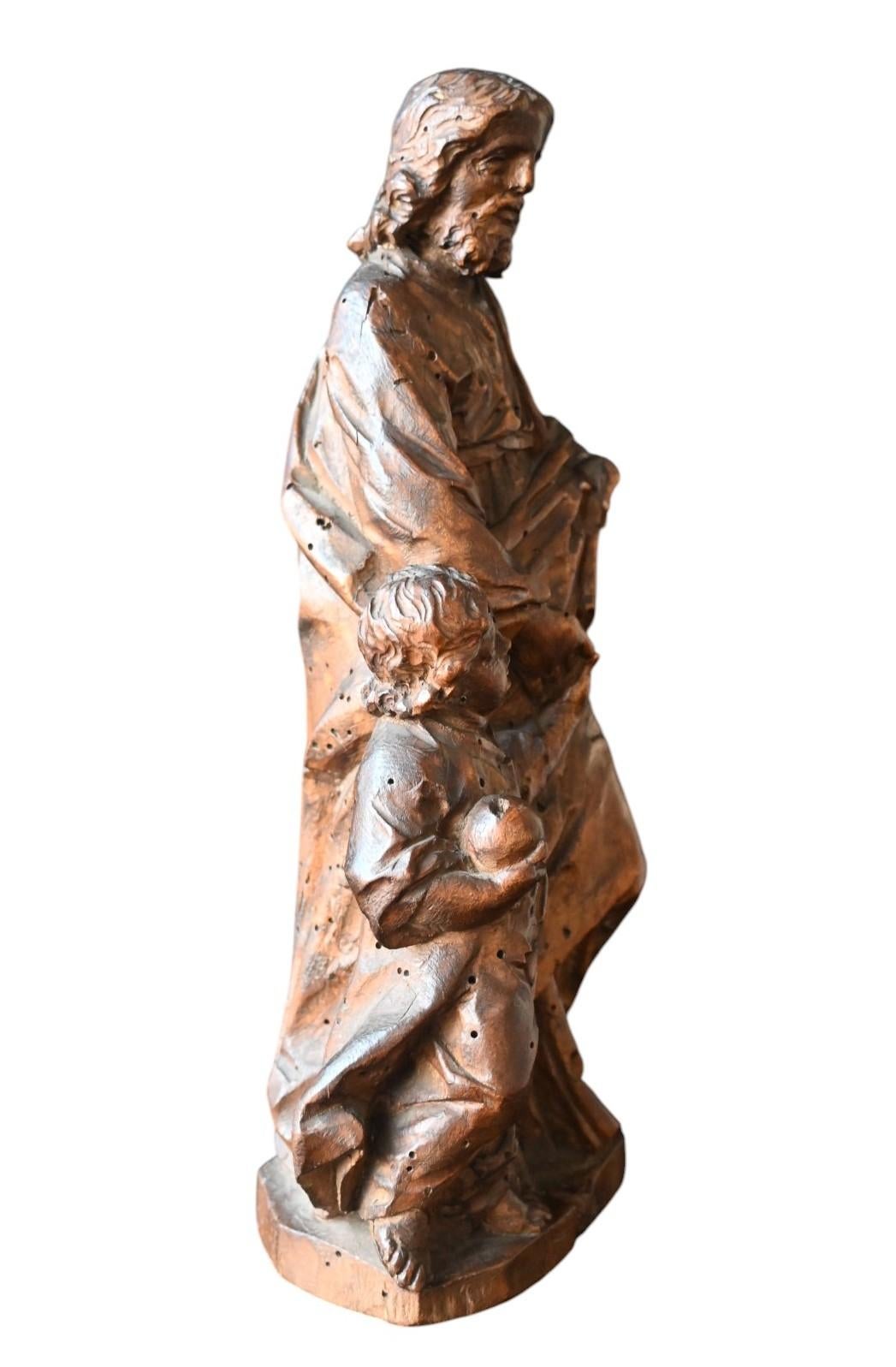 Baroque Walnut Sculpture Of Saint Joseph And The Christ Child, Early 18th C. For Sale 2
