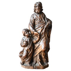 Statue ancienne en bois sculpté du 17ème siècle de Saint Joseph avec le Child Child Jesus