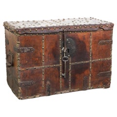 Antique 17th-century chest/safe covered in leather with the original key