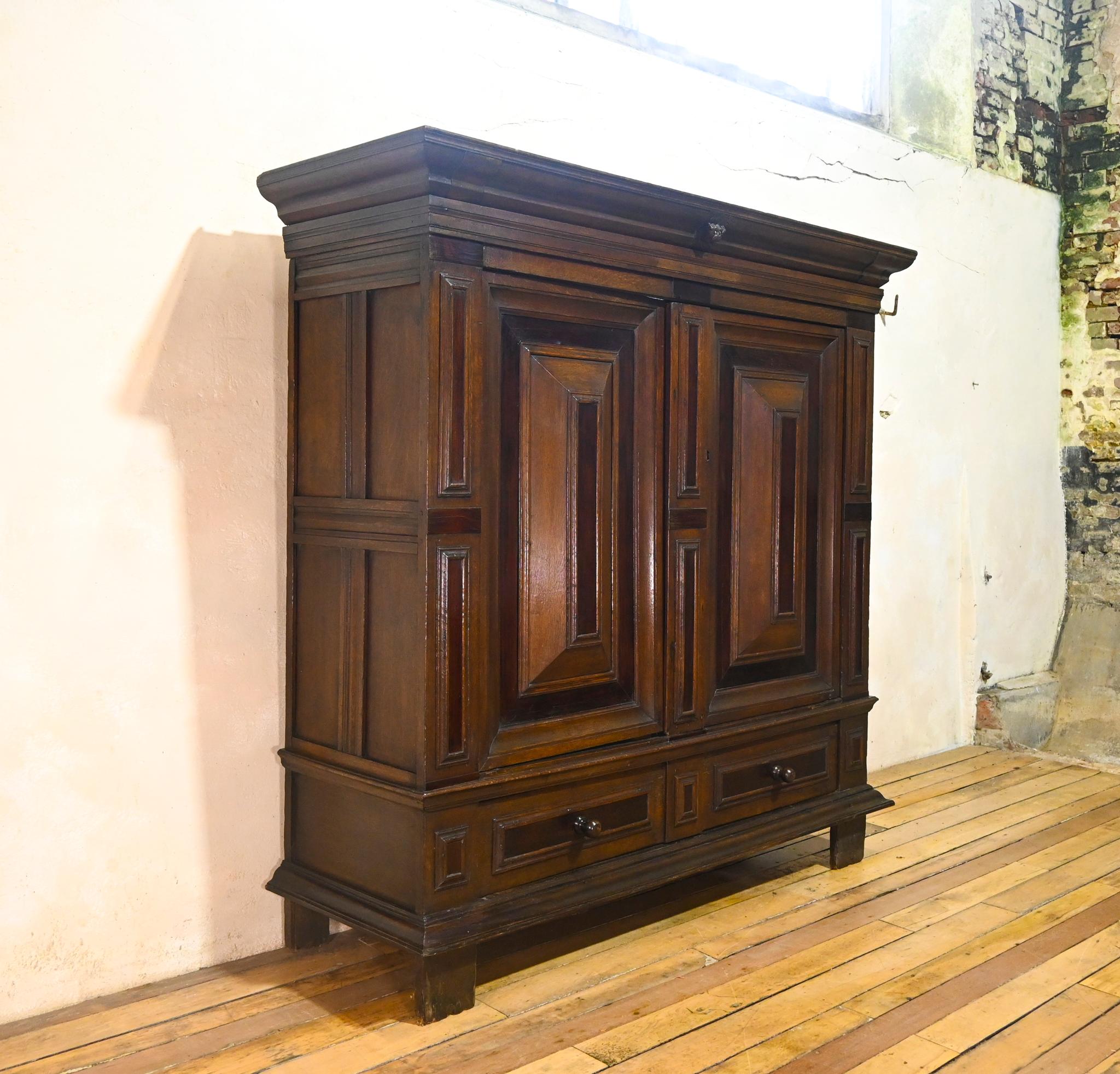 An impressive Dutch oak cupboard formally also as a 'Kast' or 'Kas'. Dating from the late 17th century, this cupboard would have originally been used for storing handmade cloth, bedding, and blankets.

The interior of this cupboard features two