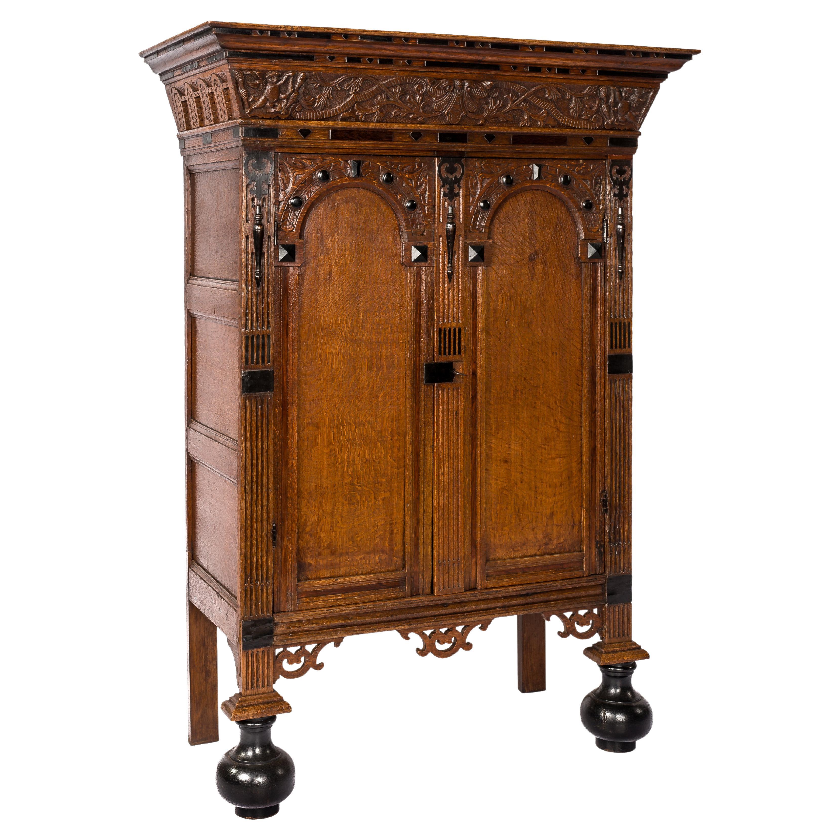 Antique 17th Century Dutch Oak and Ebony Two-Door Renaissance Cabinet For Sale