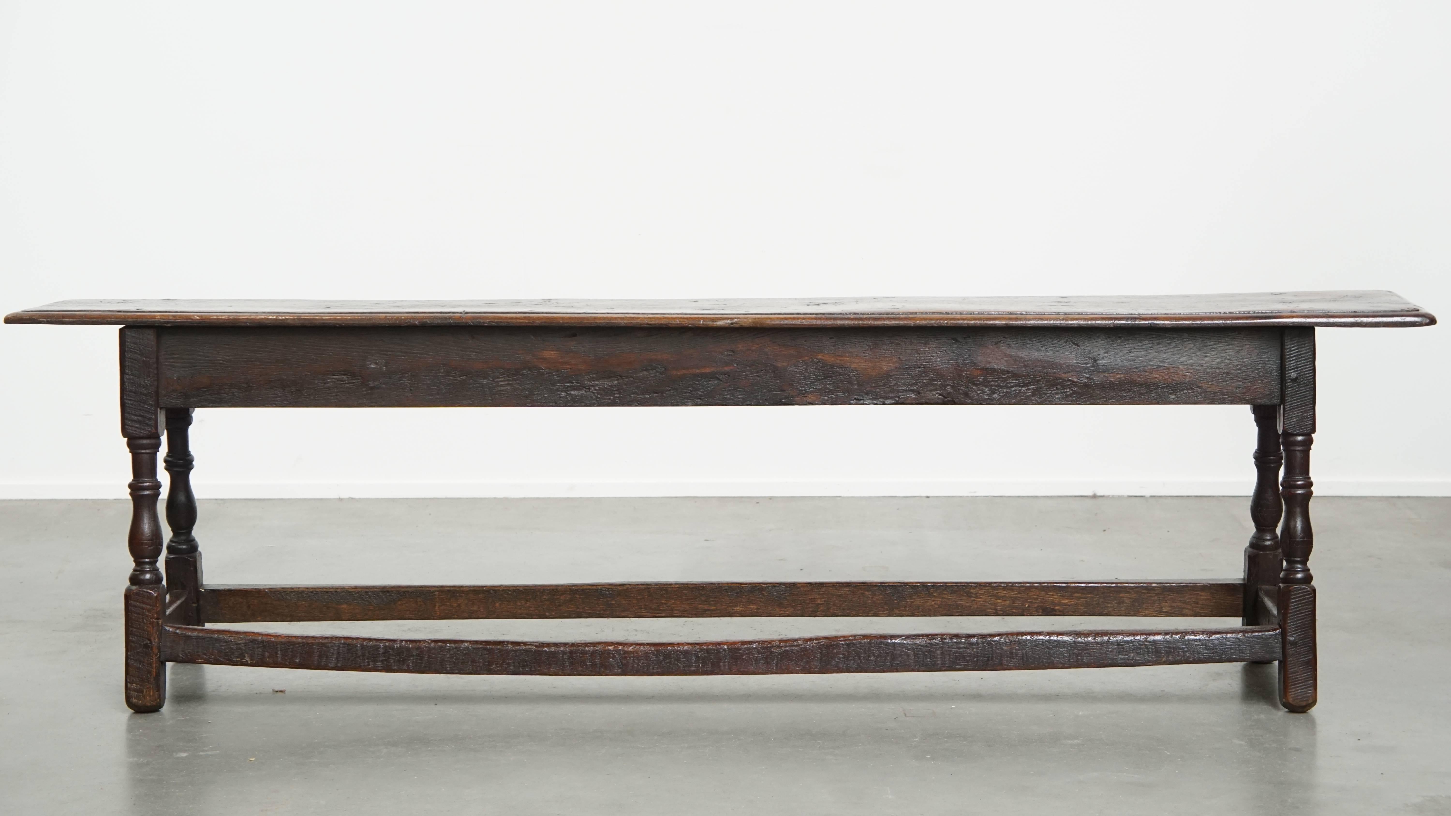 Offered for sale is this classic antique 17th century English oak joint stool / bench for the dining table.
This beautiful and rare English bench from the 17th century is a fantastic piece for lovers of authentic and pure antiques. It features