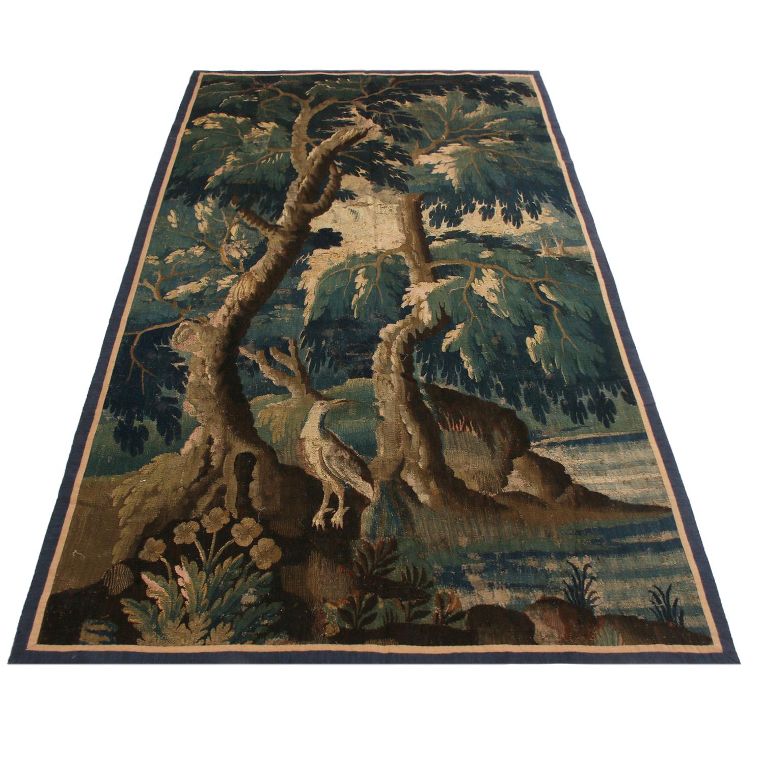 Tapisserie ancienne flamande du 17ème siècle en laine brune, verte et bleue.