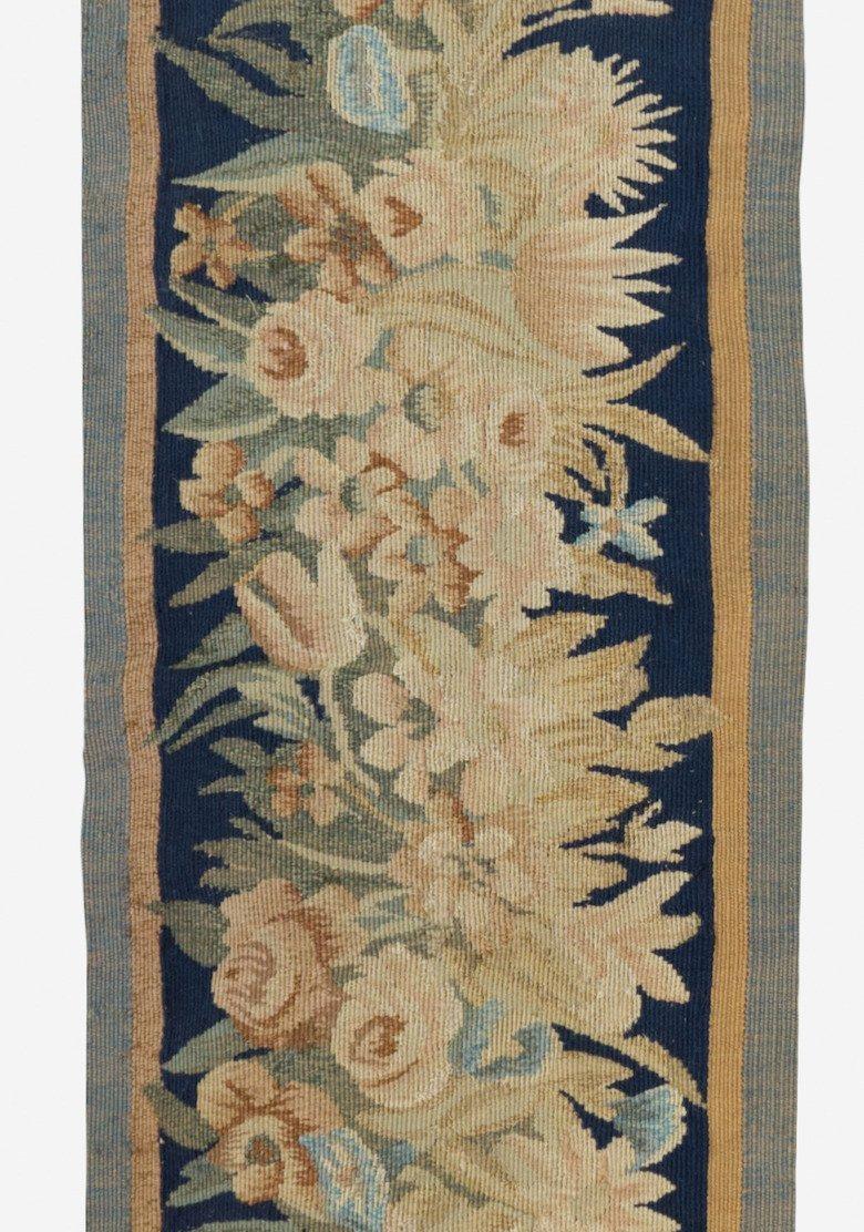 Lovely antique 17th century floral French Aubusson tapestry border panel in excellent condition measuring 1.3 x 7.6 ft. The piece has a finished border.







 