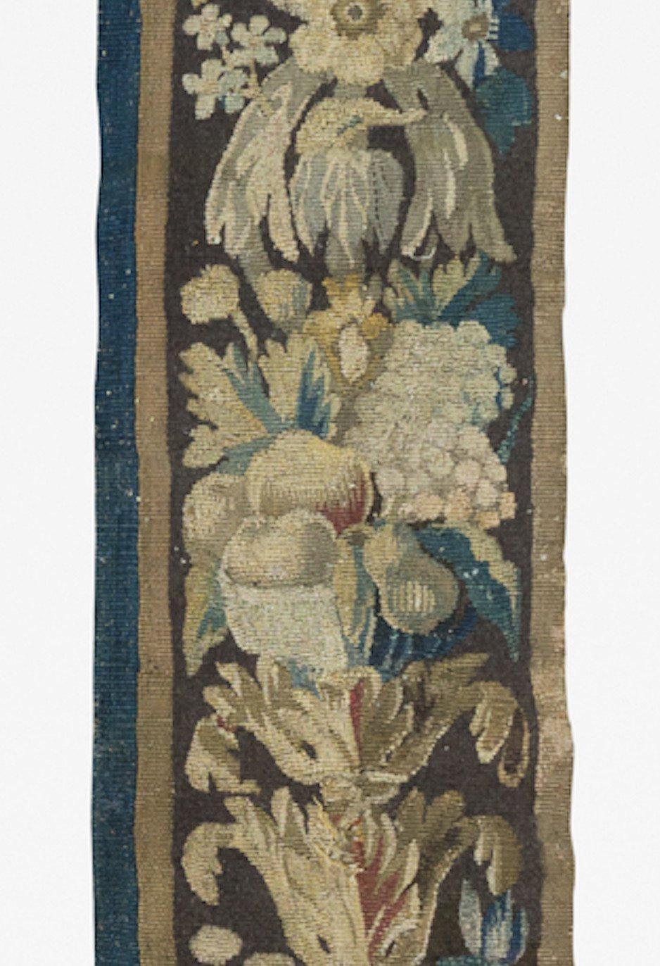 Lovely antique 17th century floral French Aubusson tapestry border panel in excellent condition measuring: 1 x 7.8 ft.

  





  