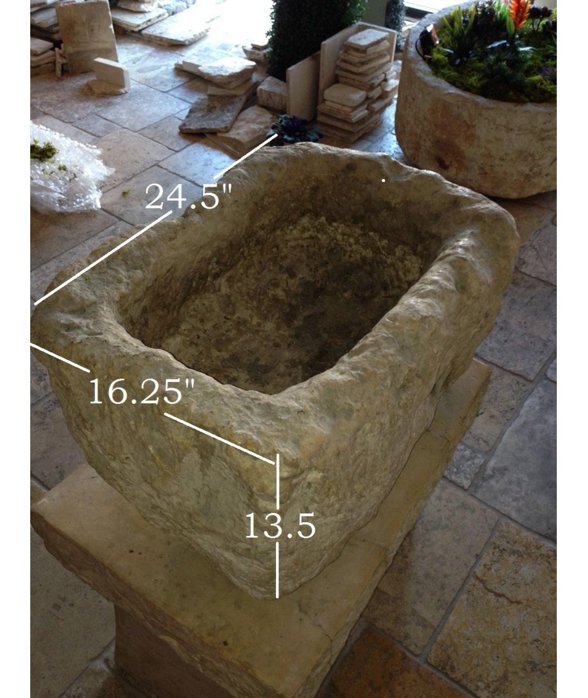 This old trough could be used as a stone planter or a stone sink. This antique limestone trough has all the signs of distressing and aging accumulating throughout the centuries to give this lovely piece its current color and patina. This 17th