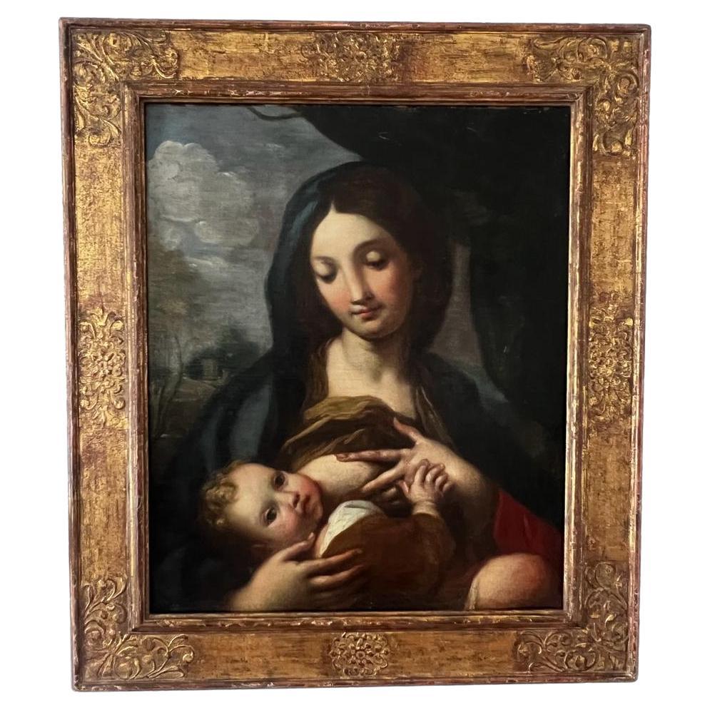 Diese prächtige Madonna mit Kind gehört zu einer itlalischen (römischen) Malschule und könnte ein Meisterwerk der Schule von Carlo Maratta /Maratti (1625-1713) sein. Marattas Stil der Barockmalerei zeichnet sich durch einen idealistischen